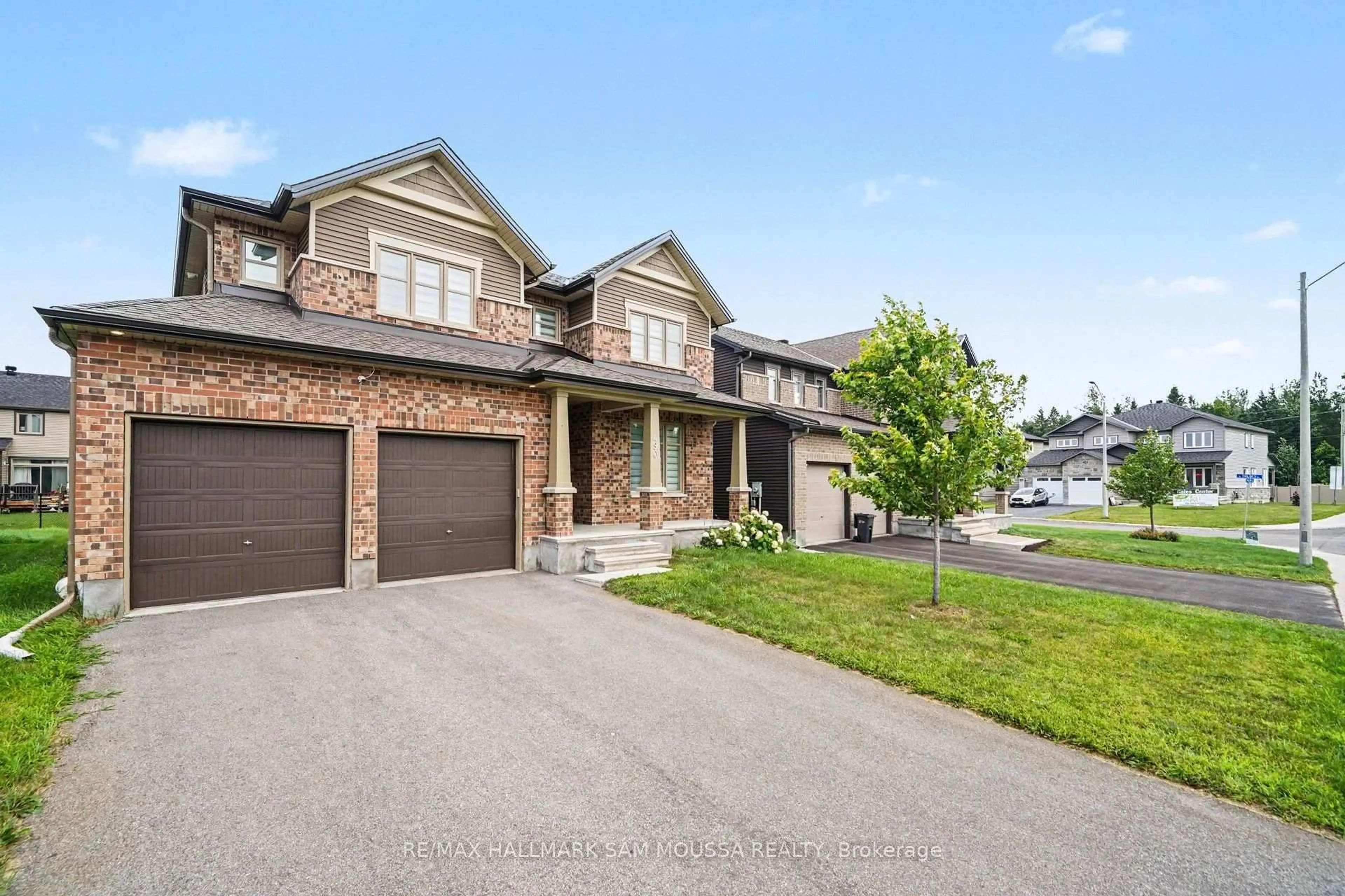 Home with brick exterior material, street for 490 Central Park Blvd, Russell Ontario K4R 0C7