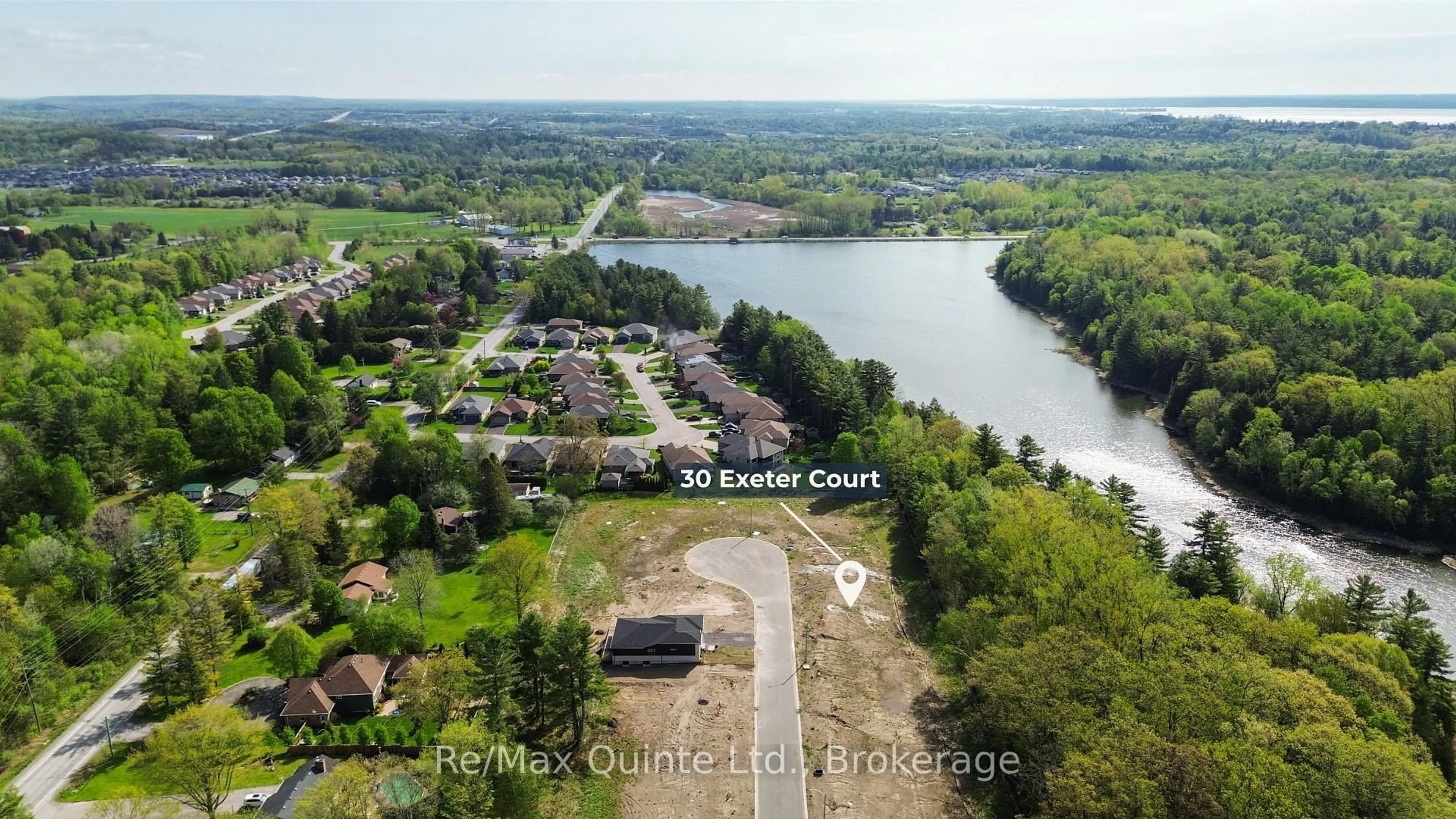 A pic from outside/outdoor area/front of a property/back of a property/a pic from drone, water/lake/river/ocean view for 30 Exeter Crt, Ingleside Ontario K8V 5P4