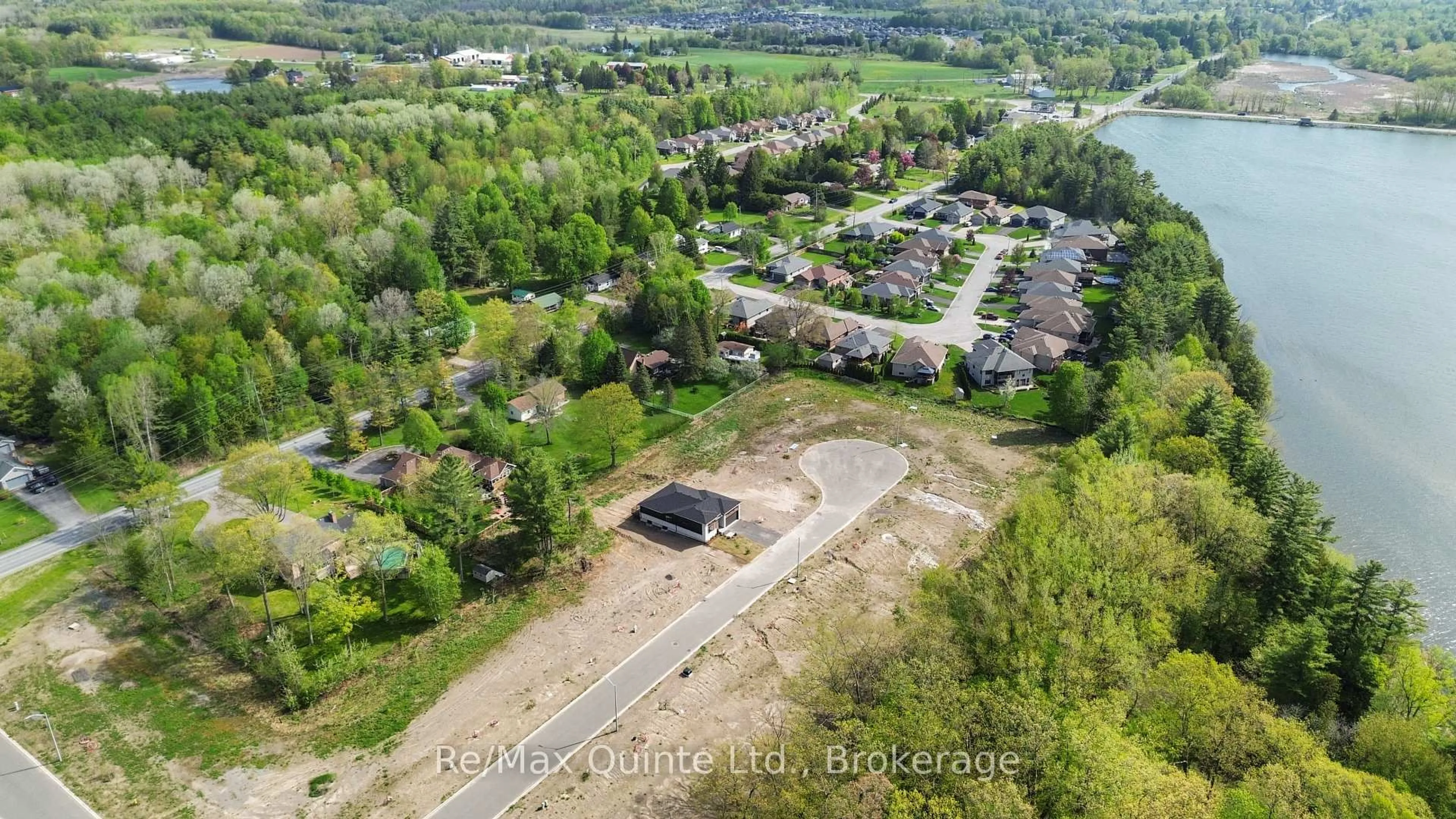 A pic from outside/outdoor area/front of a property/back of a property/a pic from drone, unknown for 30 Exeter Crt, Ingleside Ontario K8V 5P4