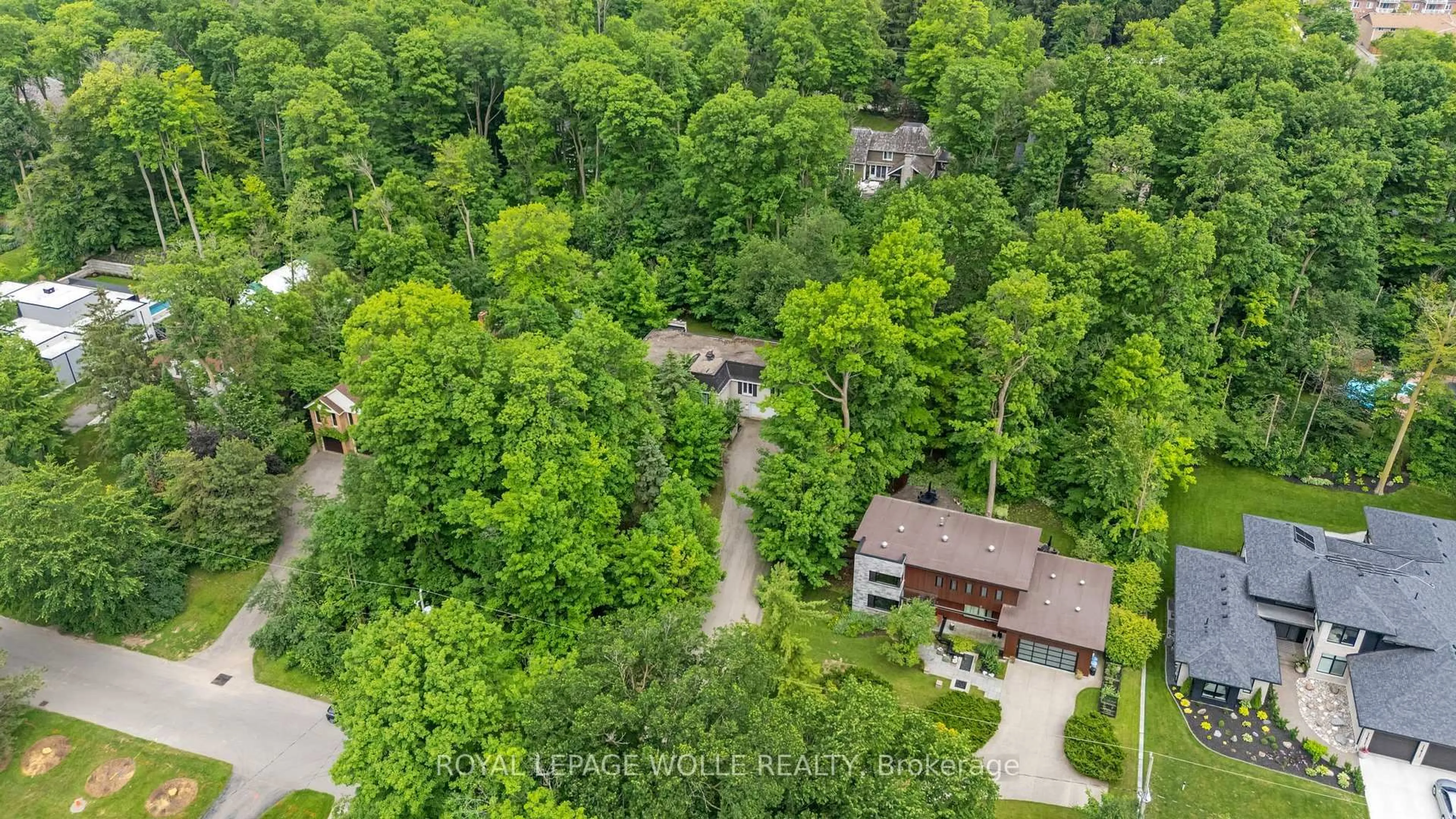 A pic from outside/outdoor area/front of a property/back of a property/a pic from drone, forest/trees view for 35 Maple Hill Dr, Kitchener Ontario N2M 2R7