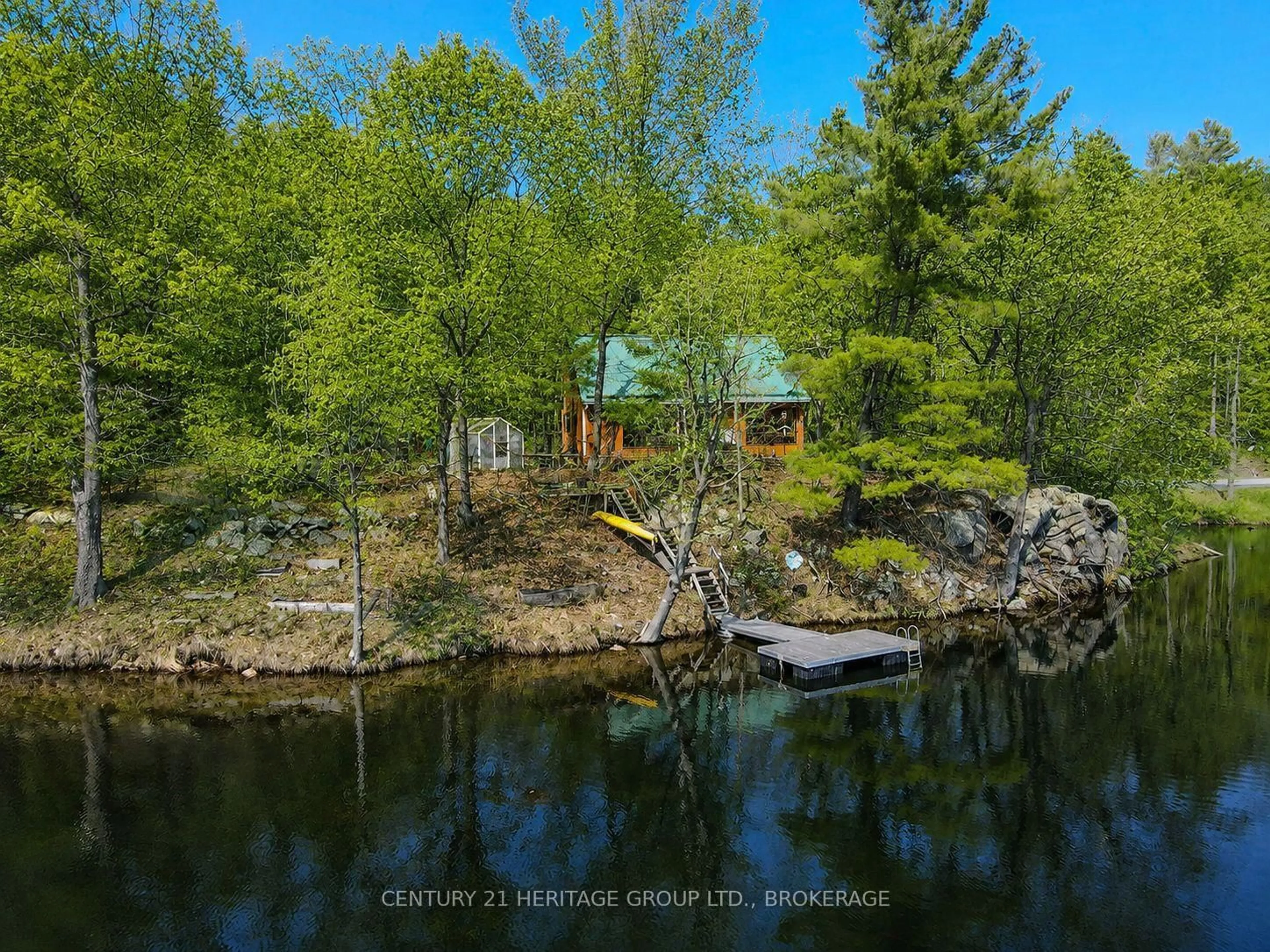A pic from outside/outdoor area/front of a property/back of a property/a pic from drone, forest/trees view for 2238 Little Long Lake Rd, Sydenham Ontario K0H 2T0