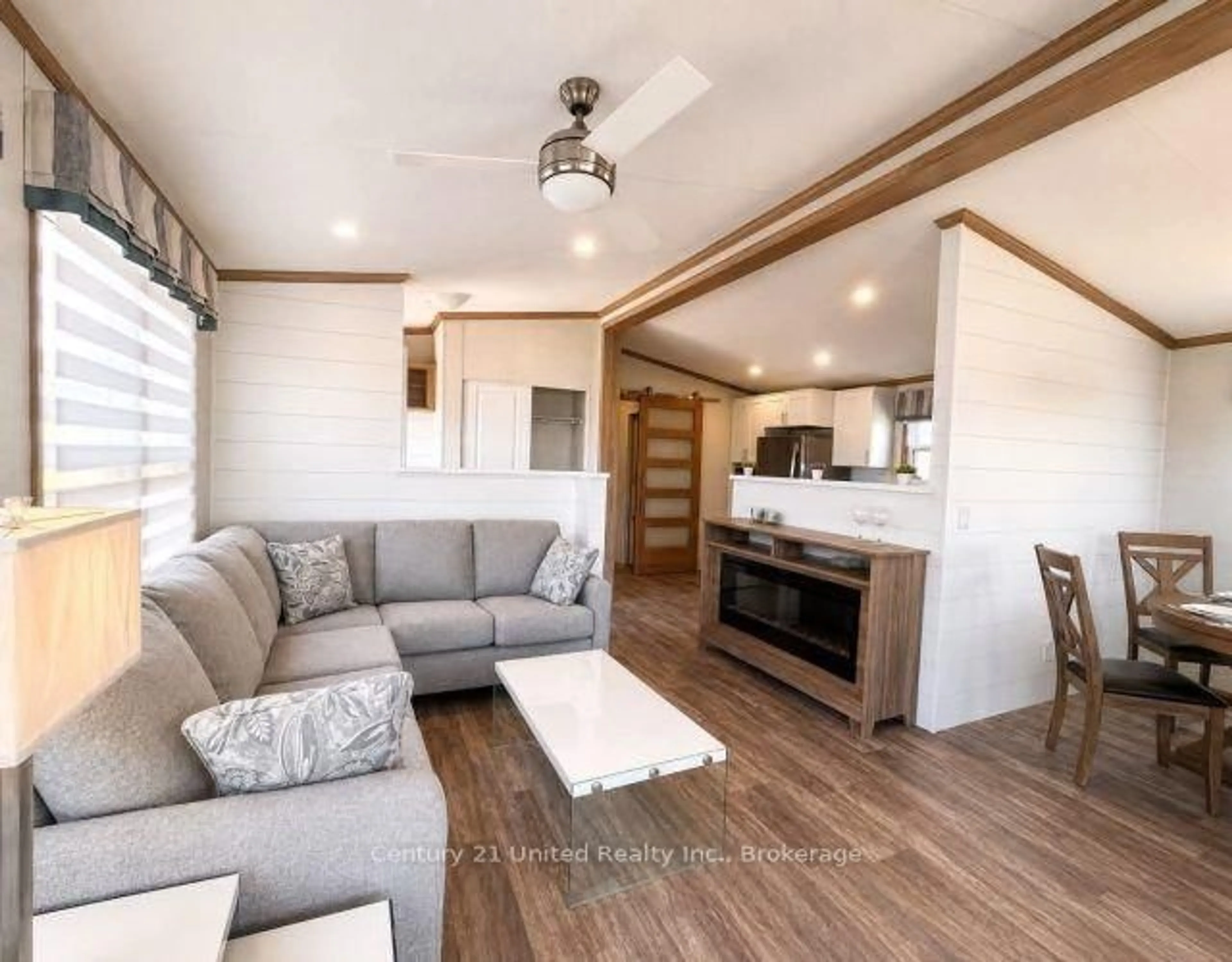 Living room with furniture, wood/laminate floor for 2806 Pigeon Lake Rd #2100121002, Kawartha Lakes Ontario K0M 1A0