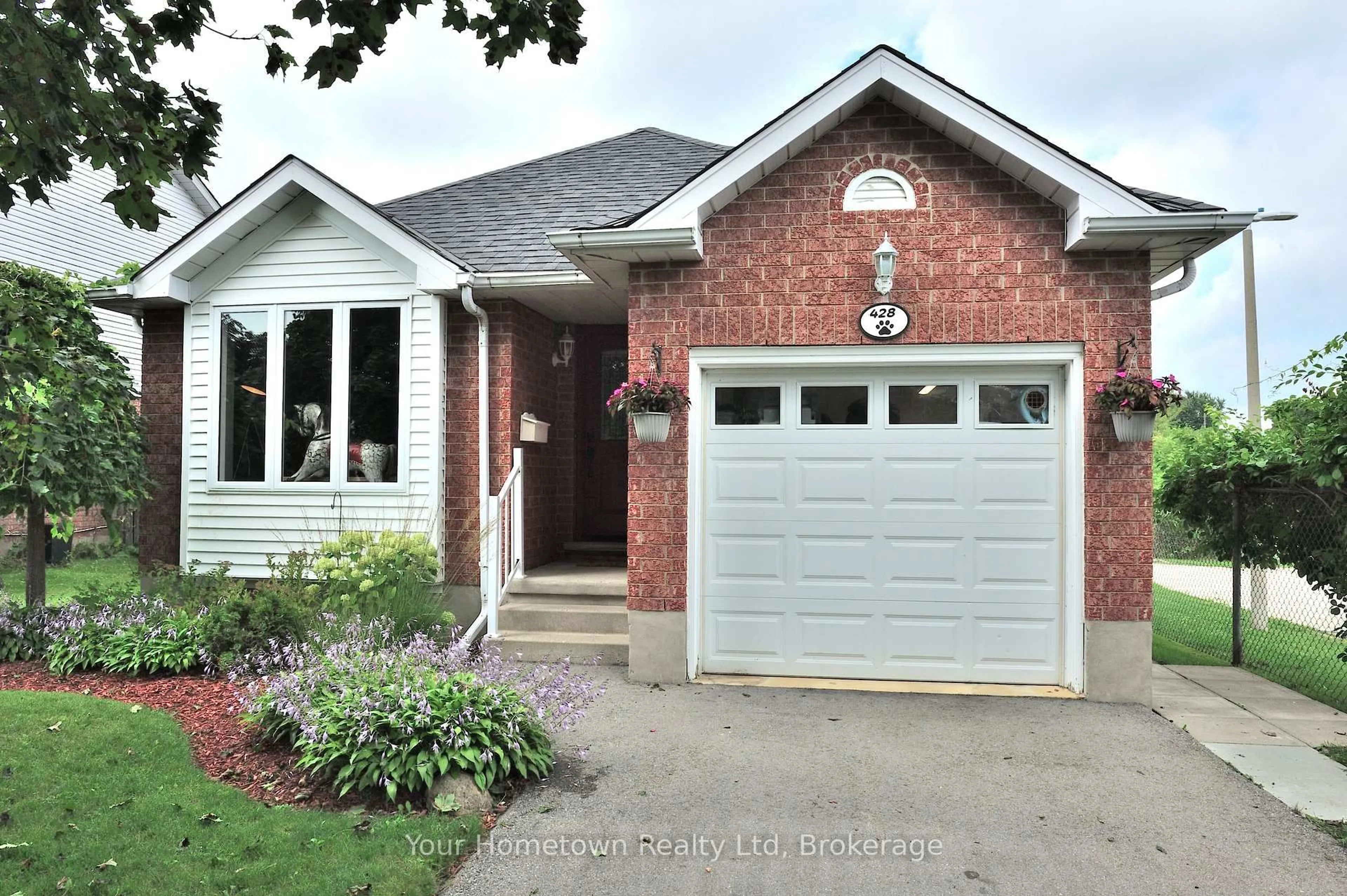 Home with brick exterior material, street for 428 Flannery Dr, Centre Wellington Ontario N1M 3P4
