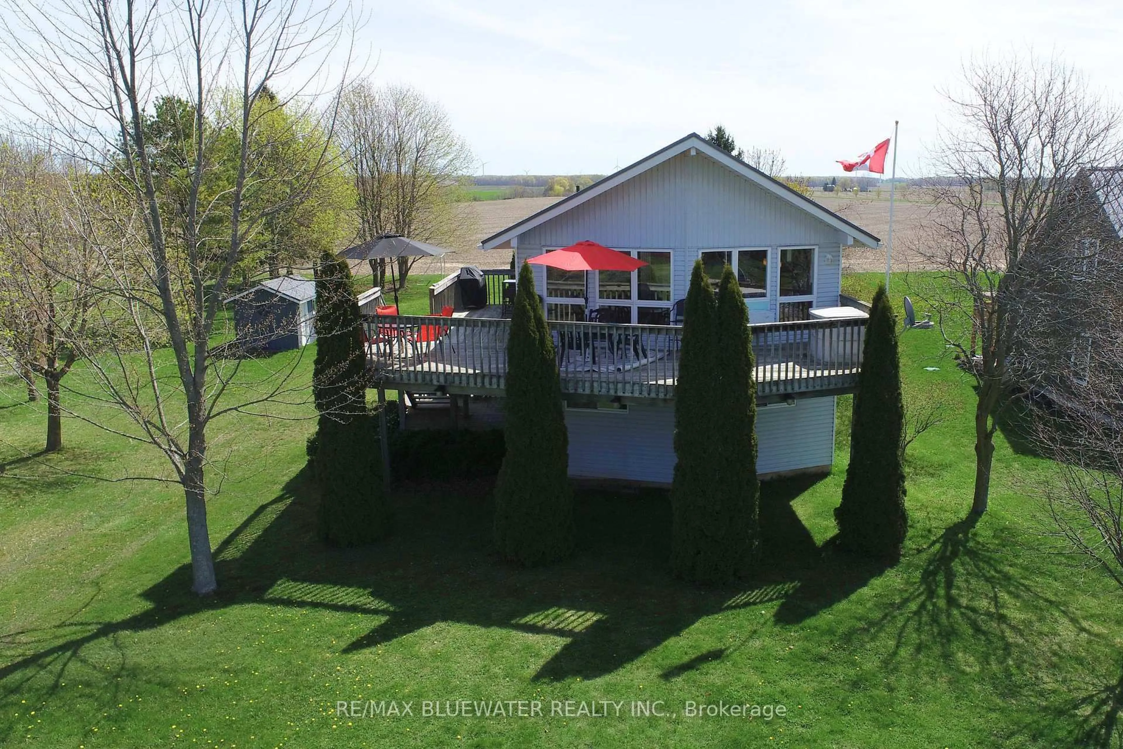 A pic from outside/outdoor area/front of a property/back of a property/a pic from drone, water/lake/river/ocean view for 74156 Bluehaven Beach Dr, Bluewater Ontario N0M 2T0