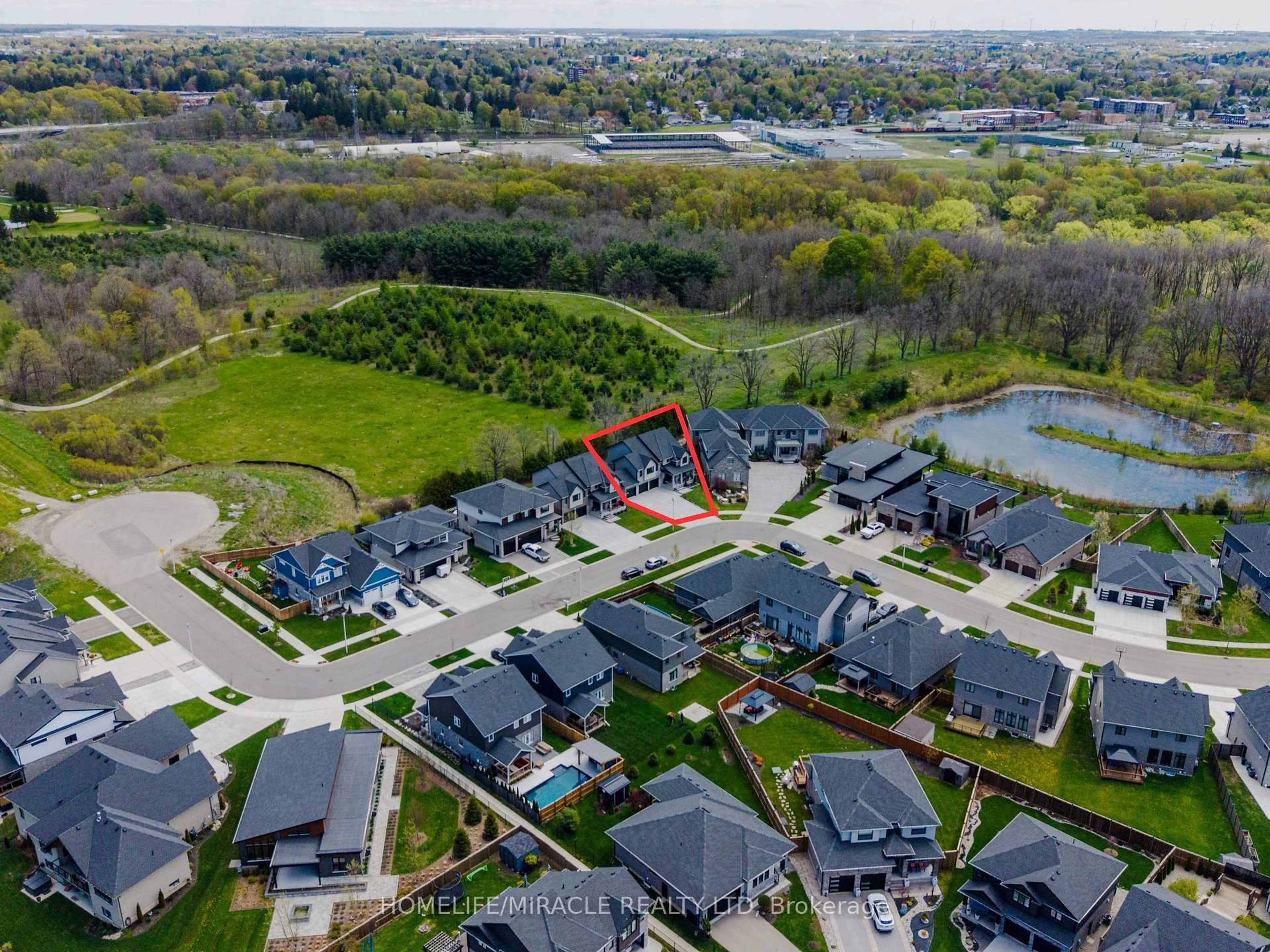 A pic from outside/outdoor area/front of a property/back of a property/a pic from drone, water/lake/river/ocean view for 245 Tamarack Blvd, Woodstock Ontario N4S 0E4