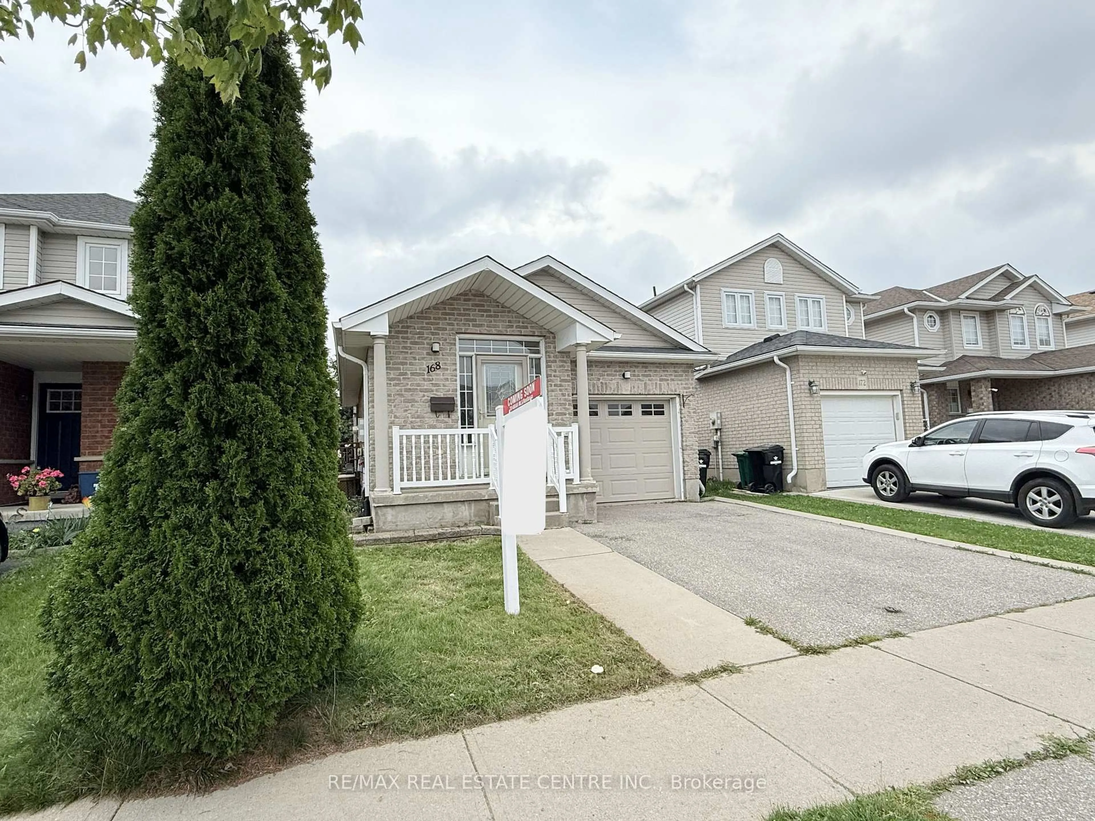 Home with vinyl exterior material, street for 168 Copper Leaf St, Kitchener Ontario N2E 3V9