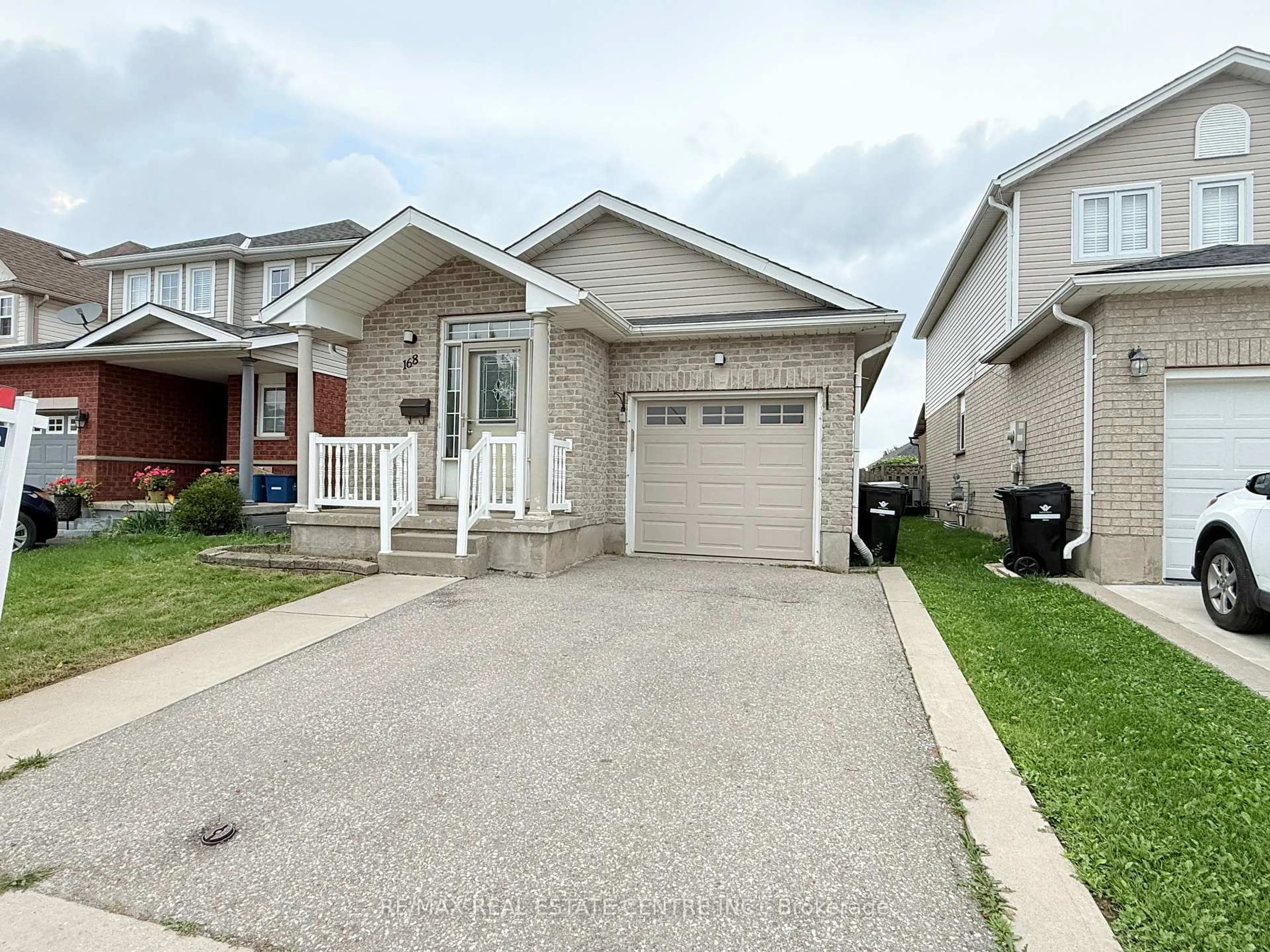 Home with vinyl exterior material, street for 168 Copper Leaf St, Kitchener Ontario N2E 3V9