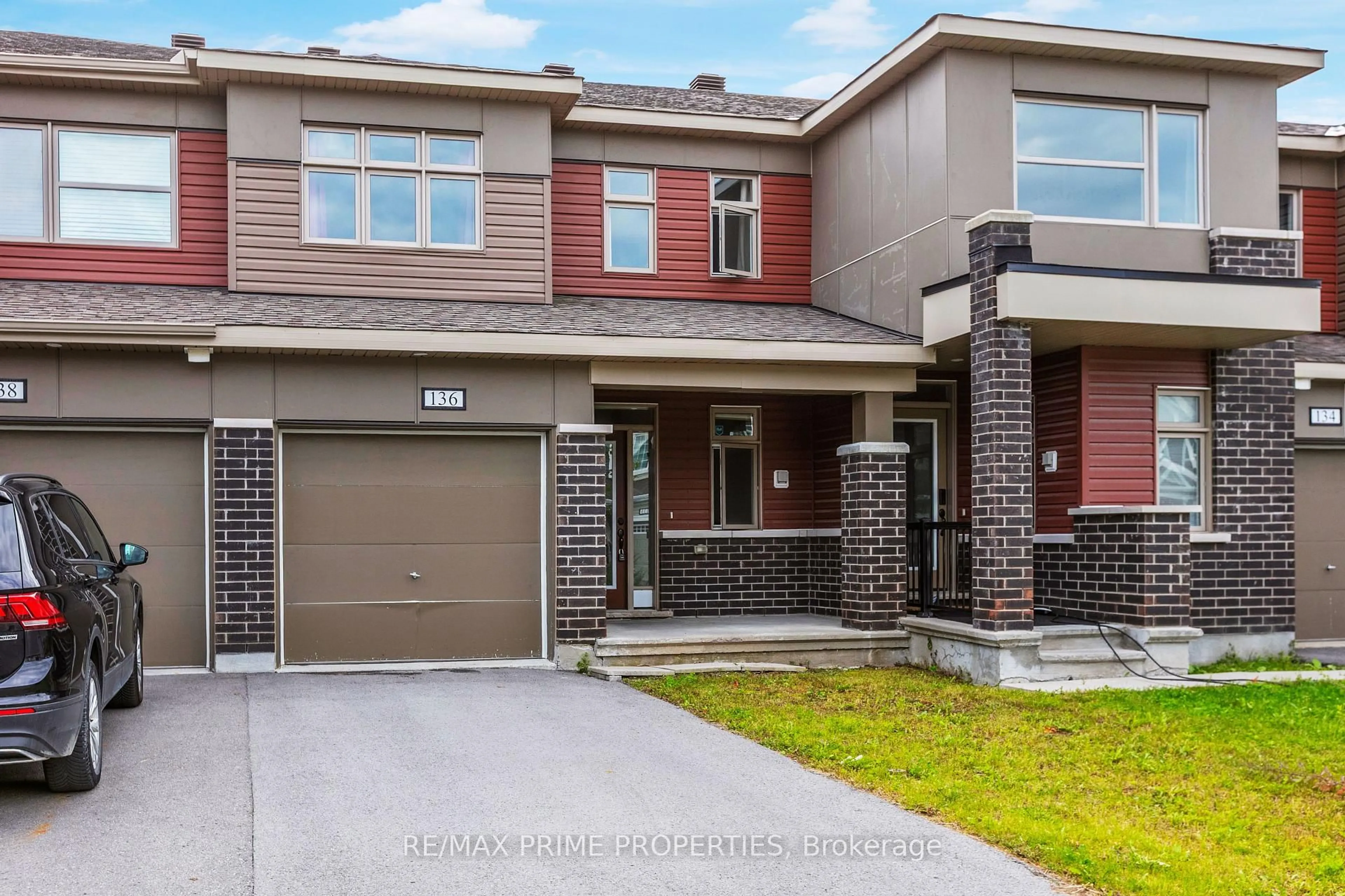 Home with brick exterior material, street for 136 Lanceleaf Way, Stittsville Ontario K2V 0J9