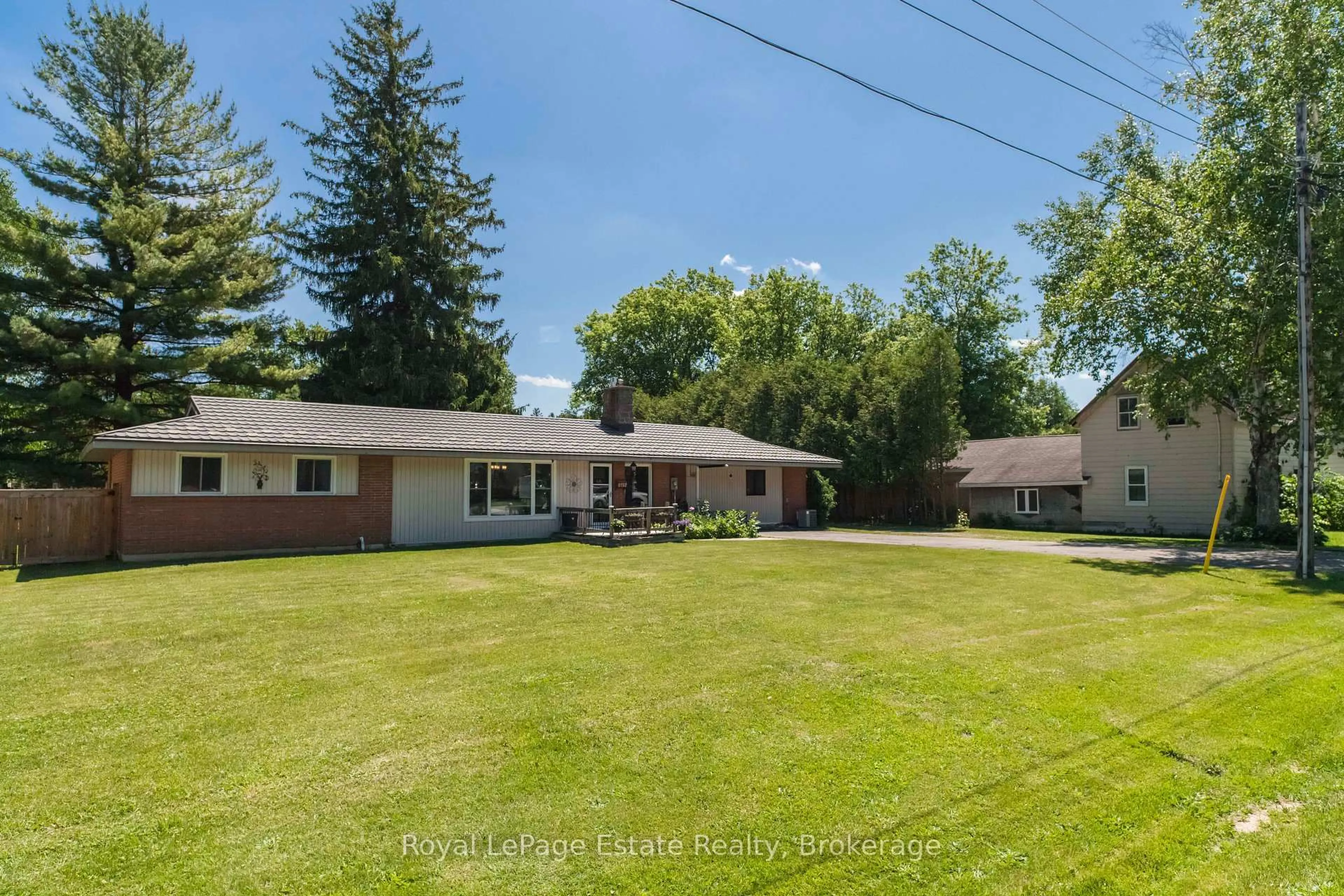 A pic from outside/outdoor area/front of a property/back of a property/a pic from drone, street for 497 Elizabeth St, South Bruce Peninsula Ontario N0H 1P0