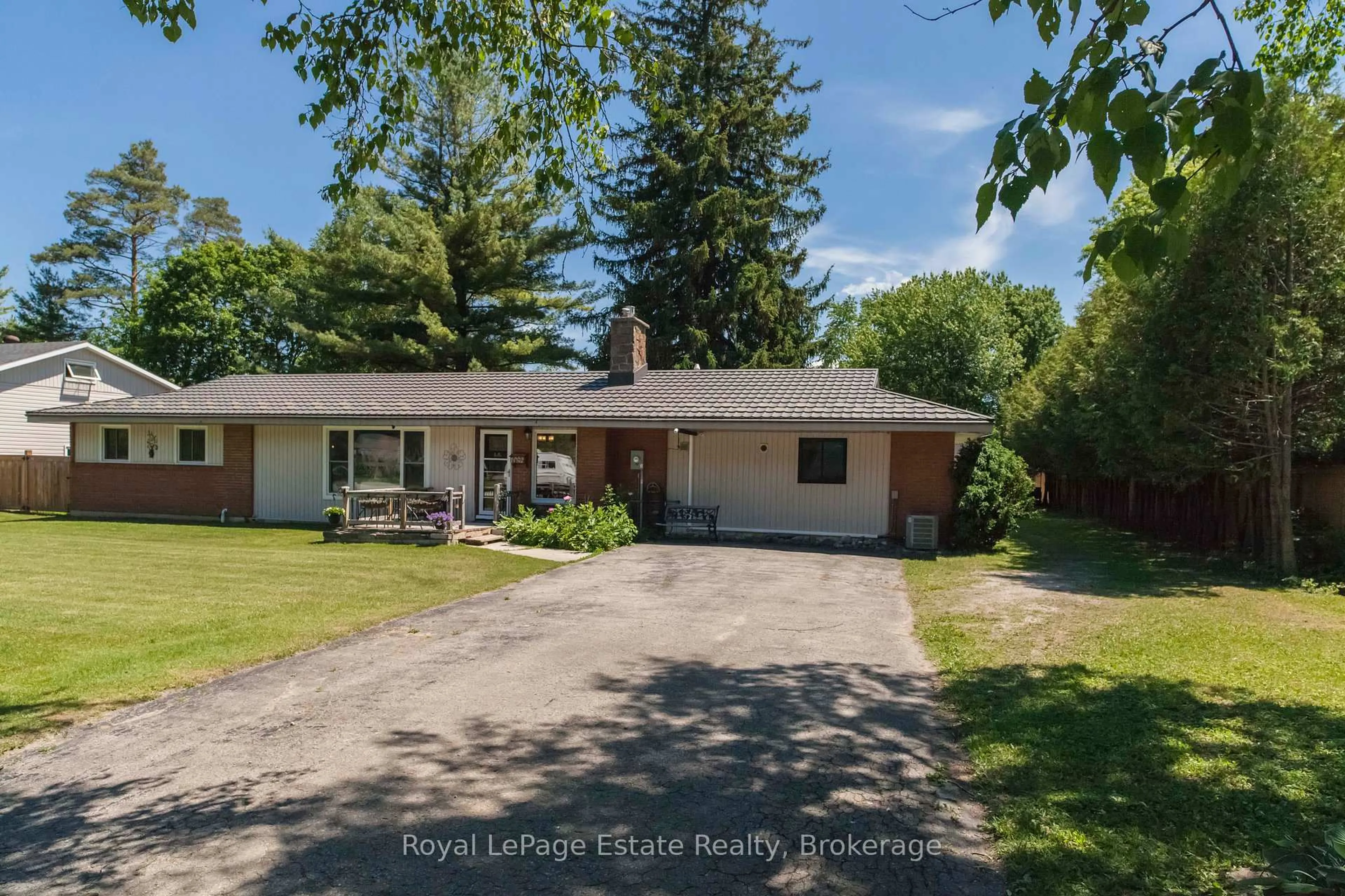 A pic from outside/outdoor area/front of a property/back of a property/a pic from drone, street for 497 Elizabeth St, South Bruce Peninsula Ontario N0H 1P0