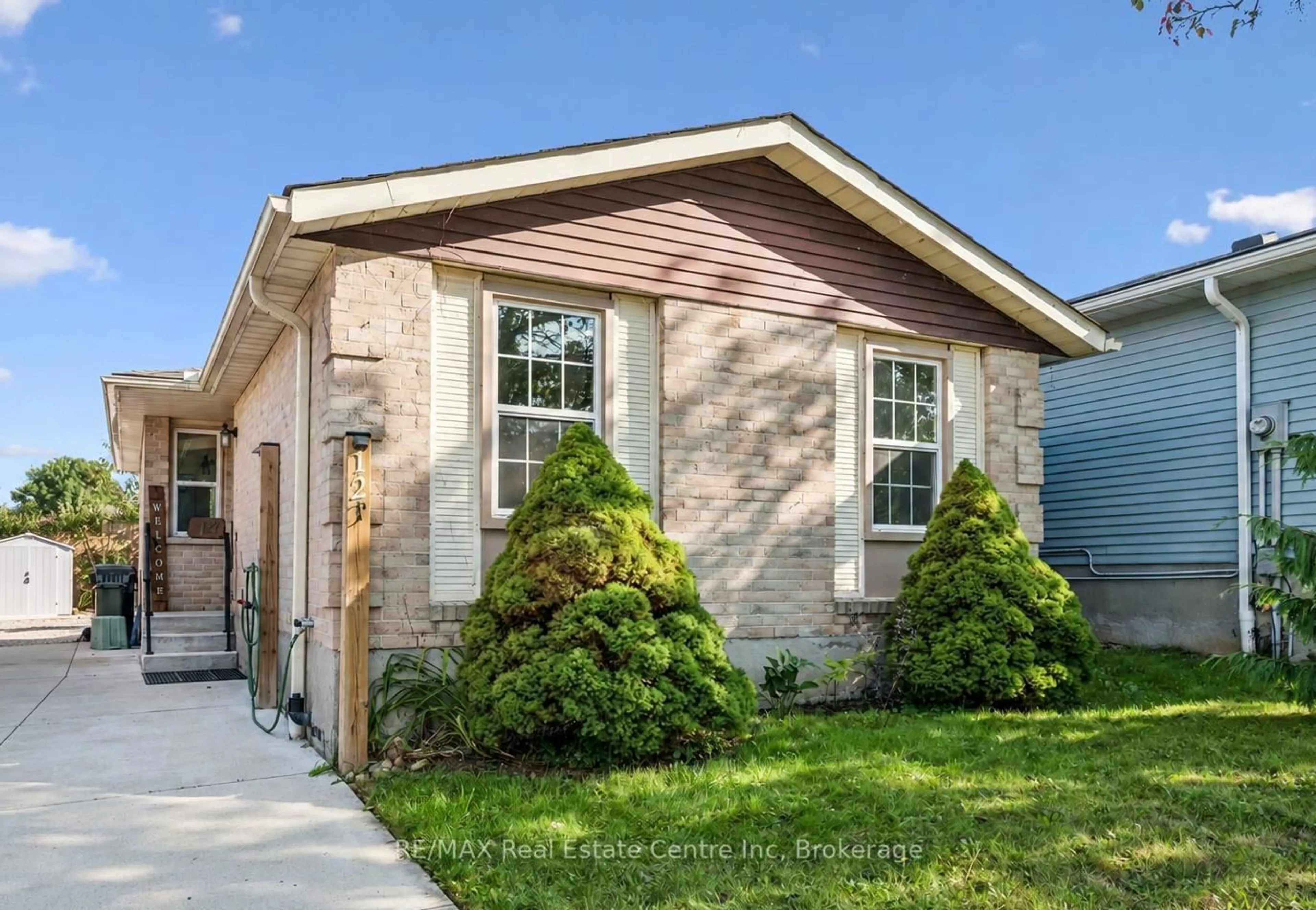 Home with brick exterior material, street for 12 MCCARTNEY Rd, Guelph Ontario N1K 1M8