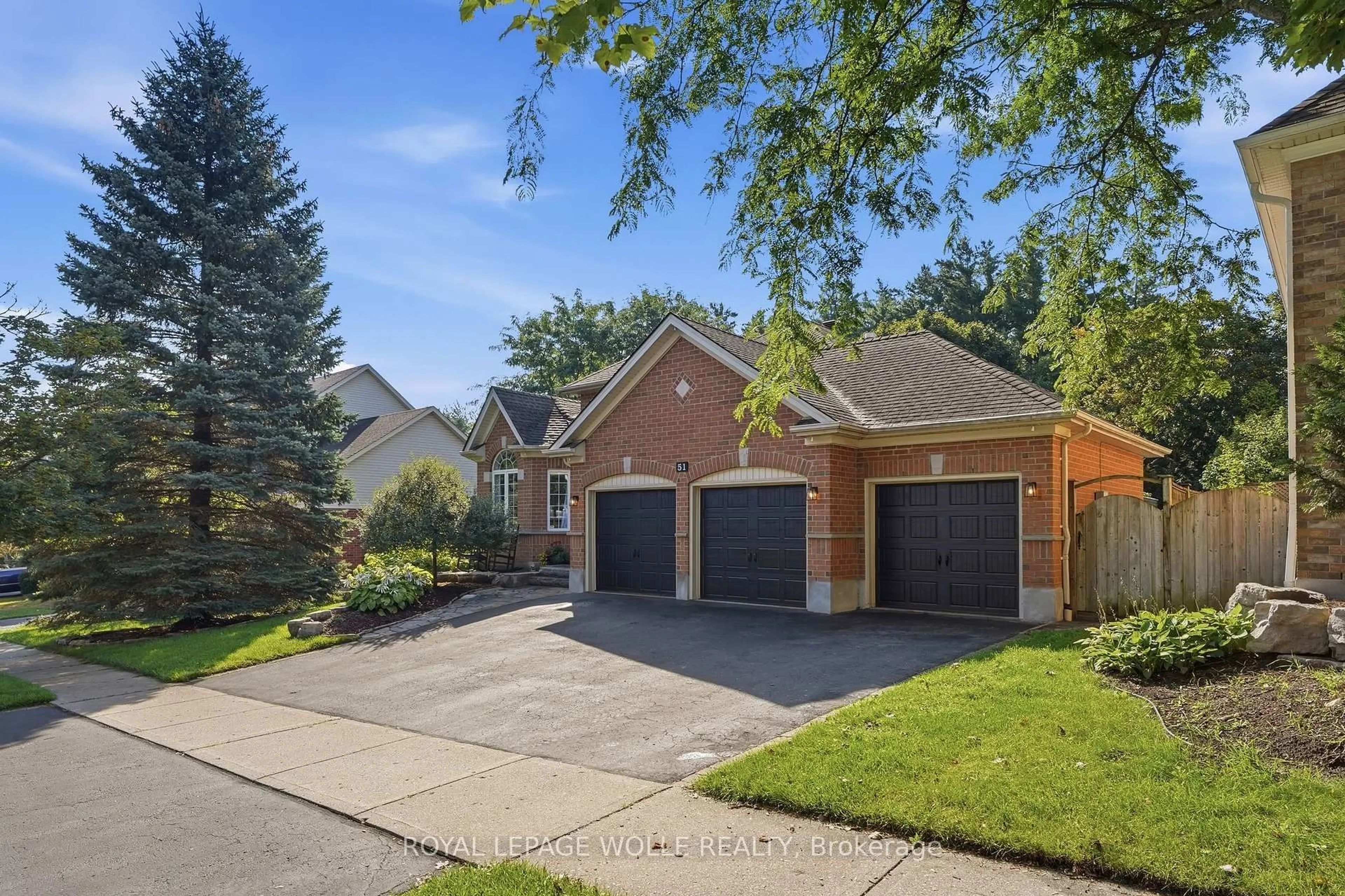 Home with brick exterior material, street for 51 Autumn Ridge Tr, Kitchener Ontario N2P 2J6