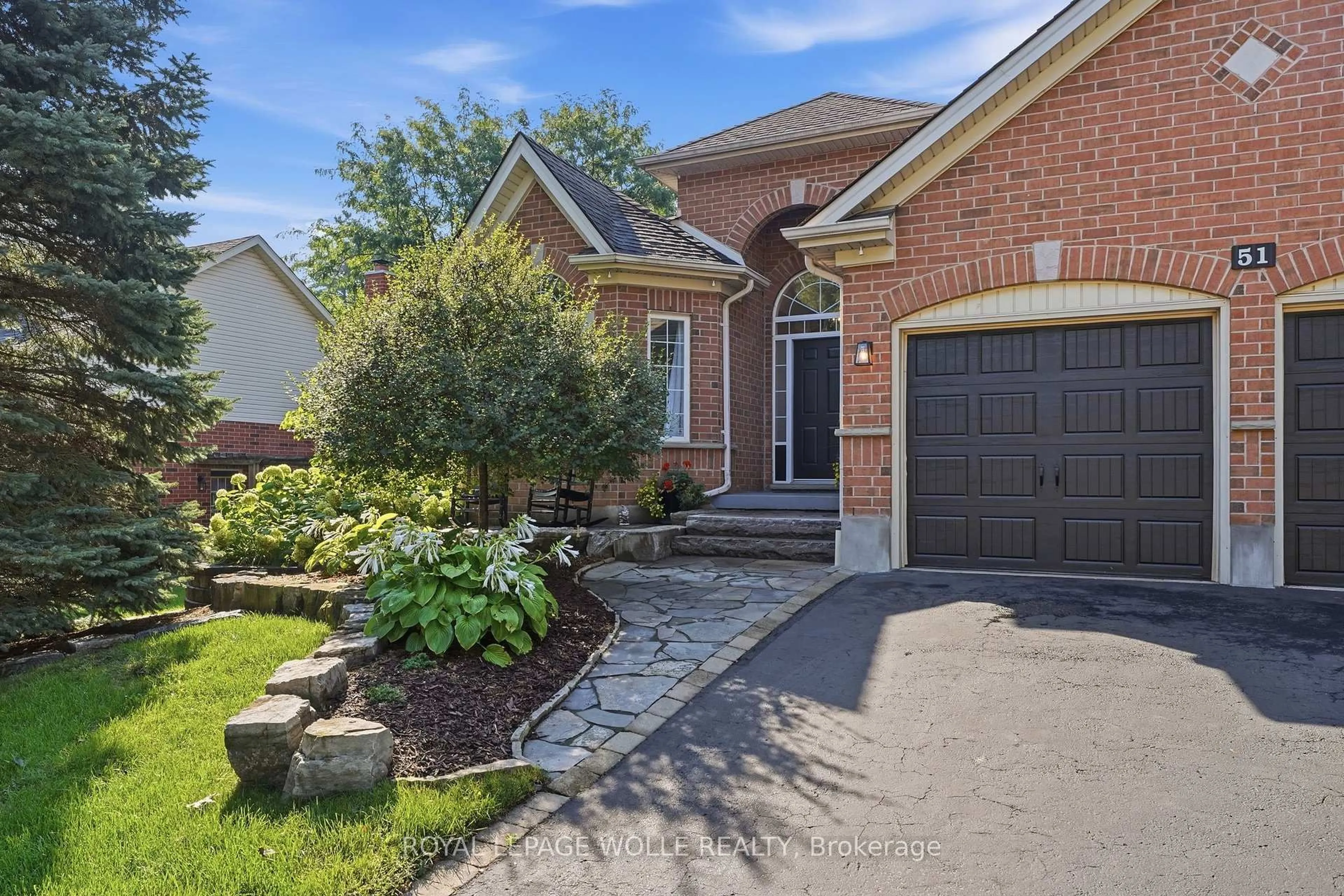 Home with brick exterior material, street for 51 Autumn Ridge Tr, Kitchener Ontario N2P 2J6