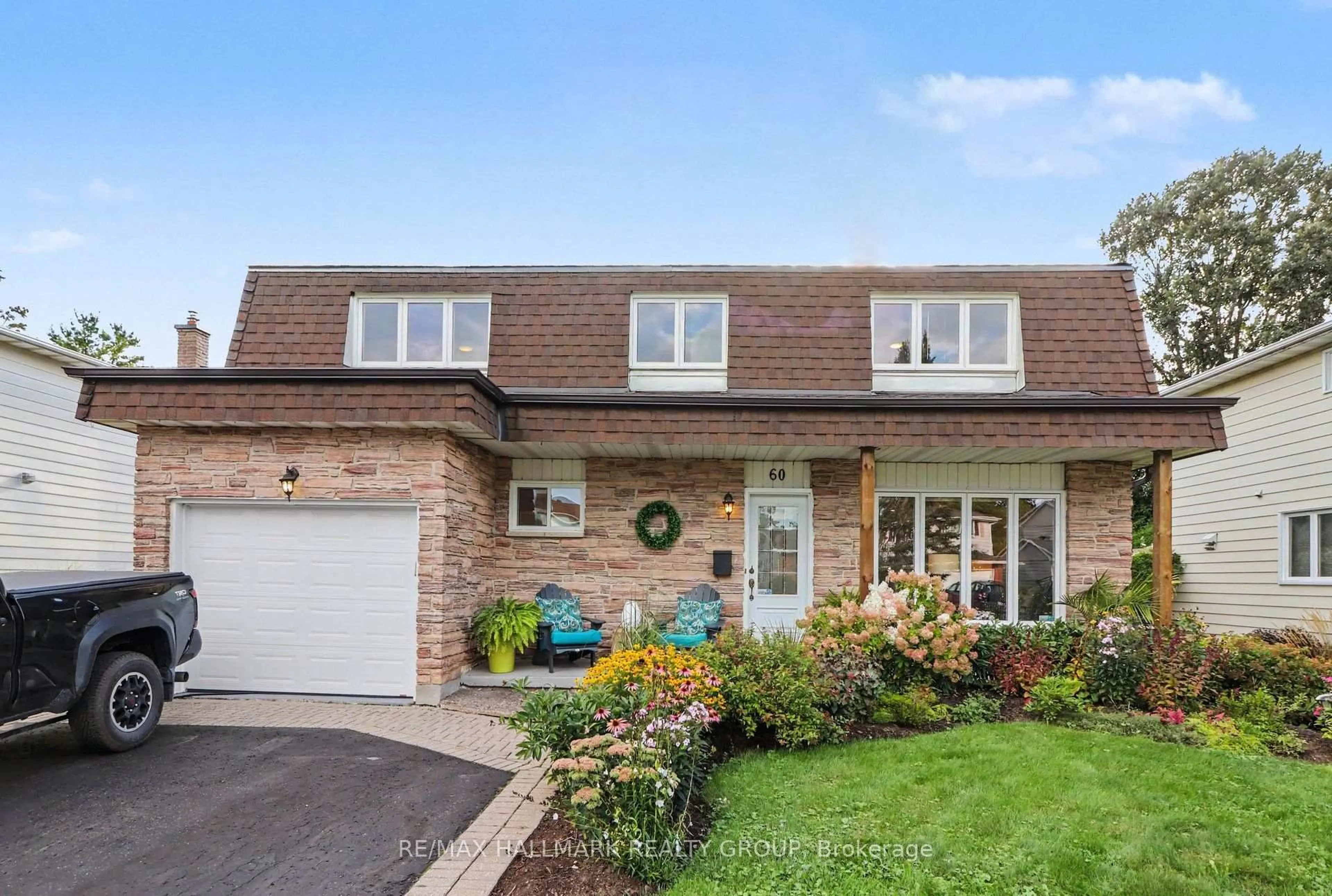 Home with brick exterior material, street for 60 Woodburn Dr, Ottawa Ontario K1B 3A7