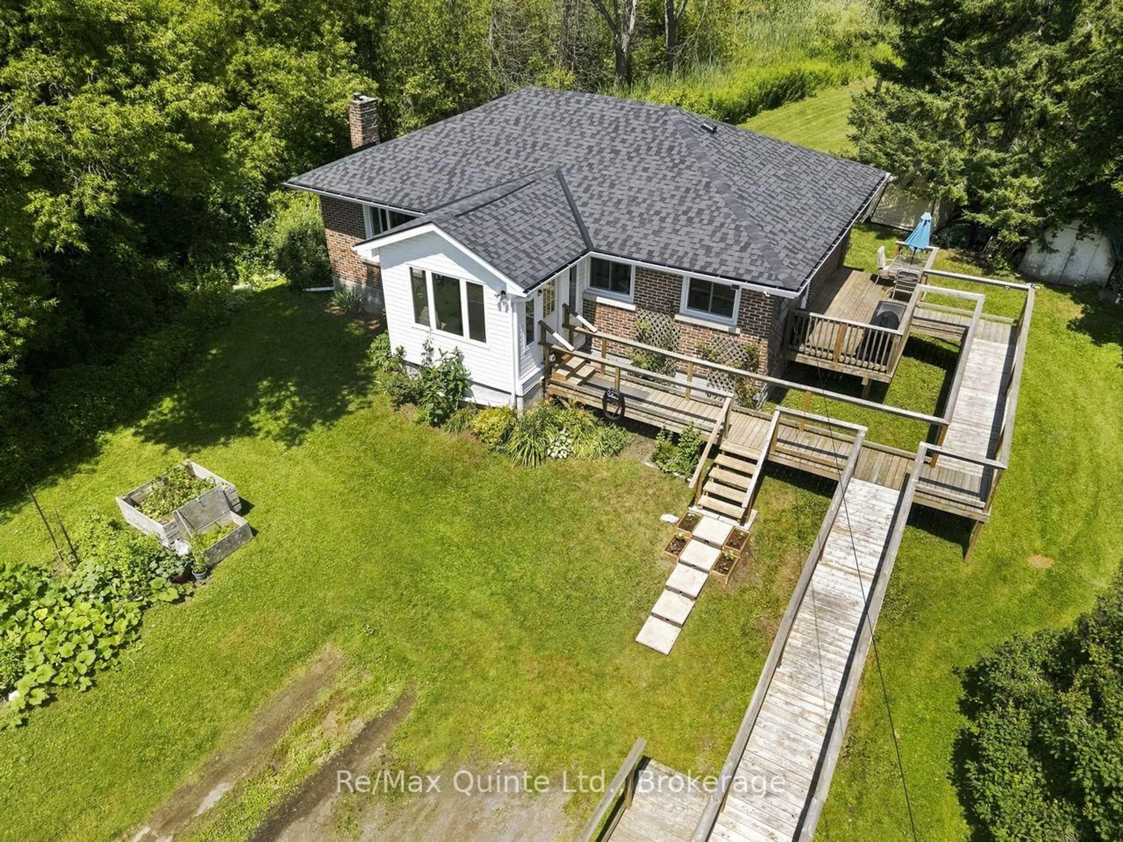 A pic from outside/outdoor area/front of a property/back of a property/a pic from drone, water/lake/river/ocean view for 15150 County Rd 2, Brighton Ontario K0K 1H0