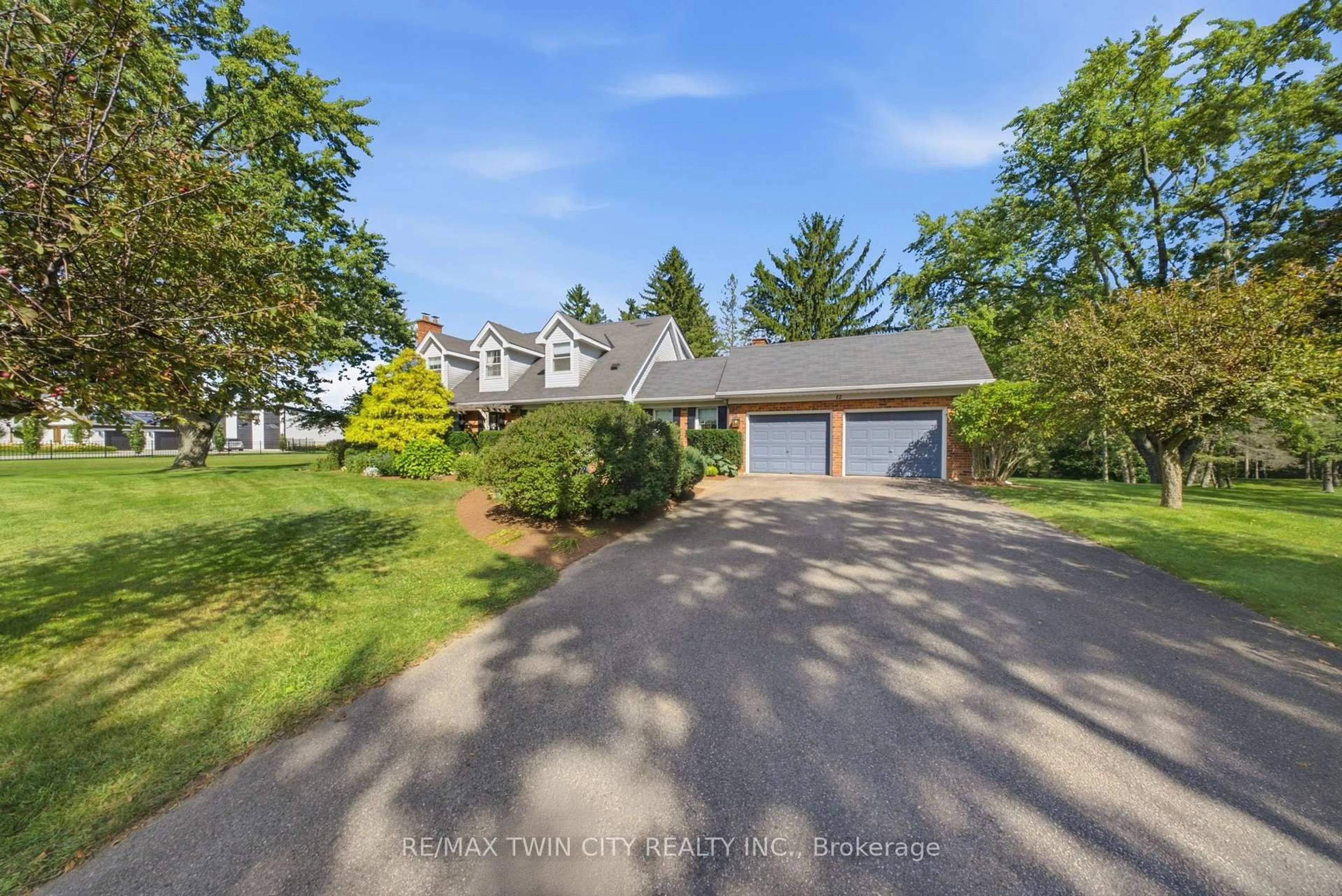 A pic from outside/outdoor area/front of a property/back of a property/a pic from drone, water/lake/river/ocean view for 12 Highland Dr, Brant Ontario N3T 5L7