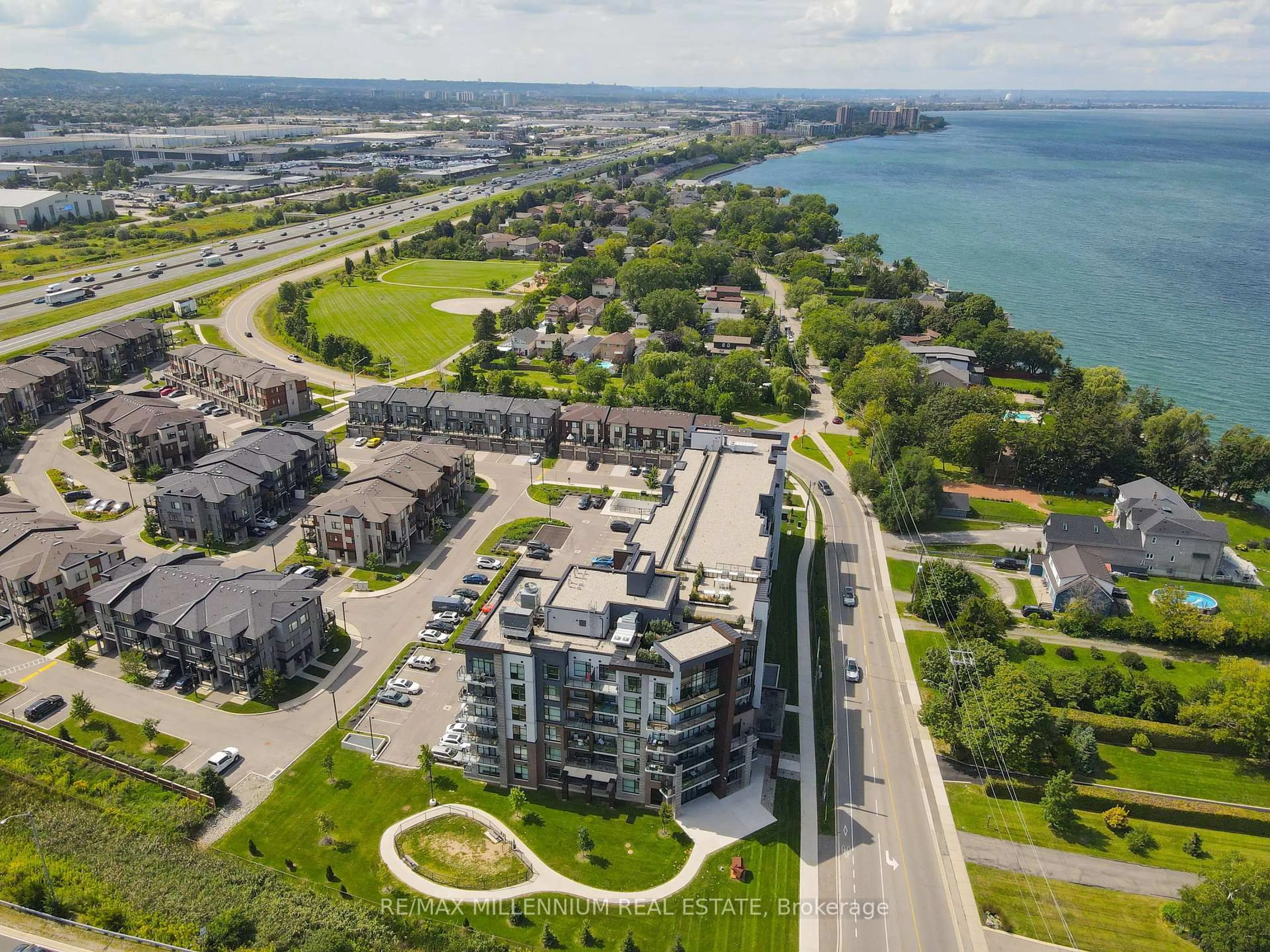 A pic from outside/outdoor area/front of a property/back of a property/a pic from drone, water/lake/river/ocean view for 600 North Service Rd #403, Hamilton Ontario L8E 5A7