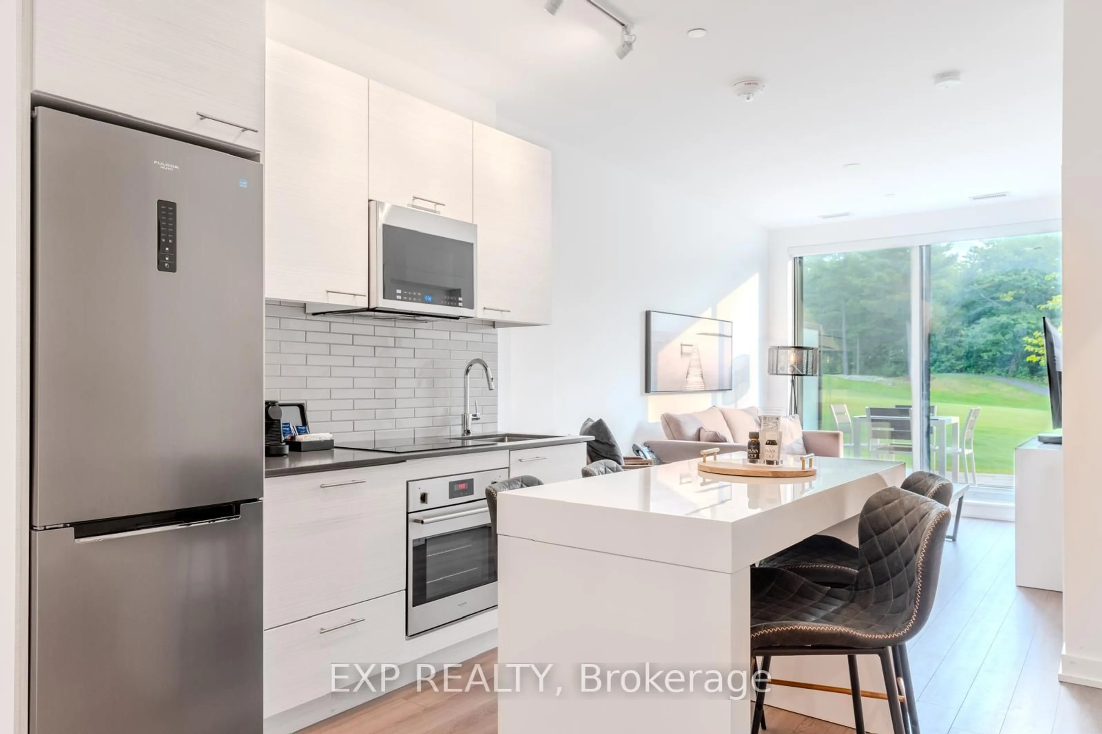Open concept kitchen, unknown for 120 Carrick Tr #102, Gravenhurst Ontario P1P 0B6