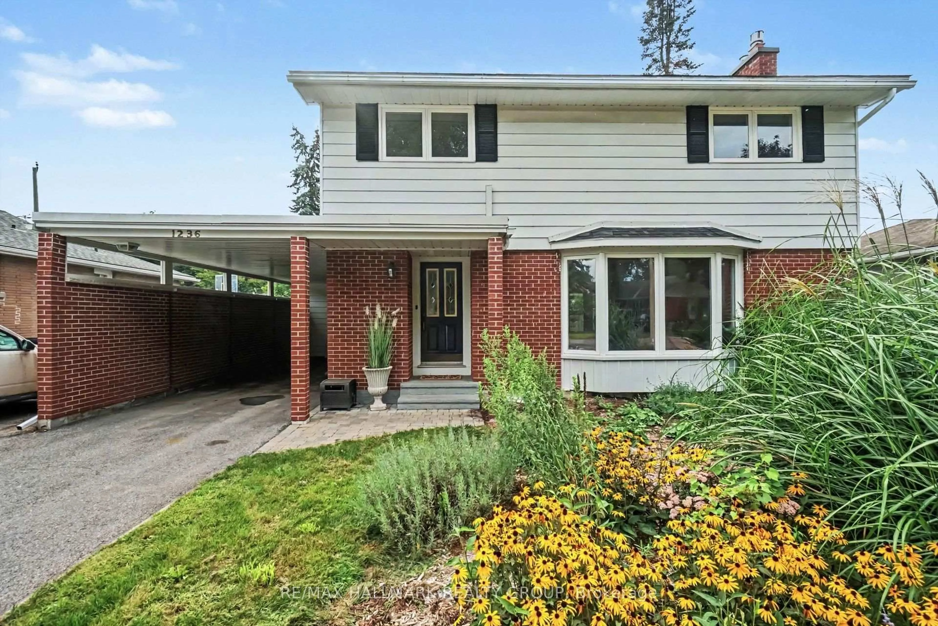 Home with brick exterior material, street for 1236 Amesbrooke Dr, Ottawa Ontario K2C 2E6