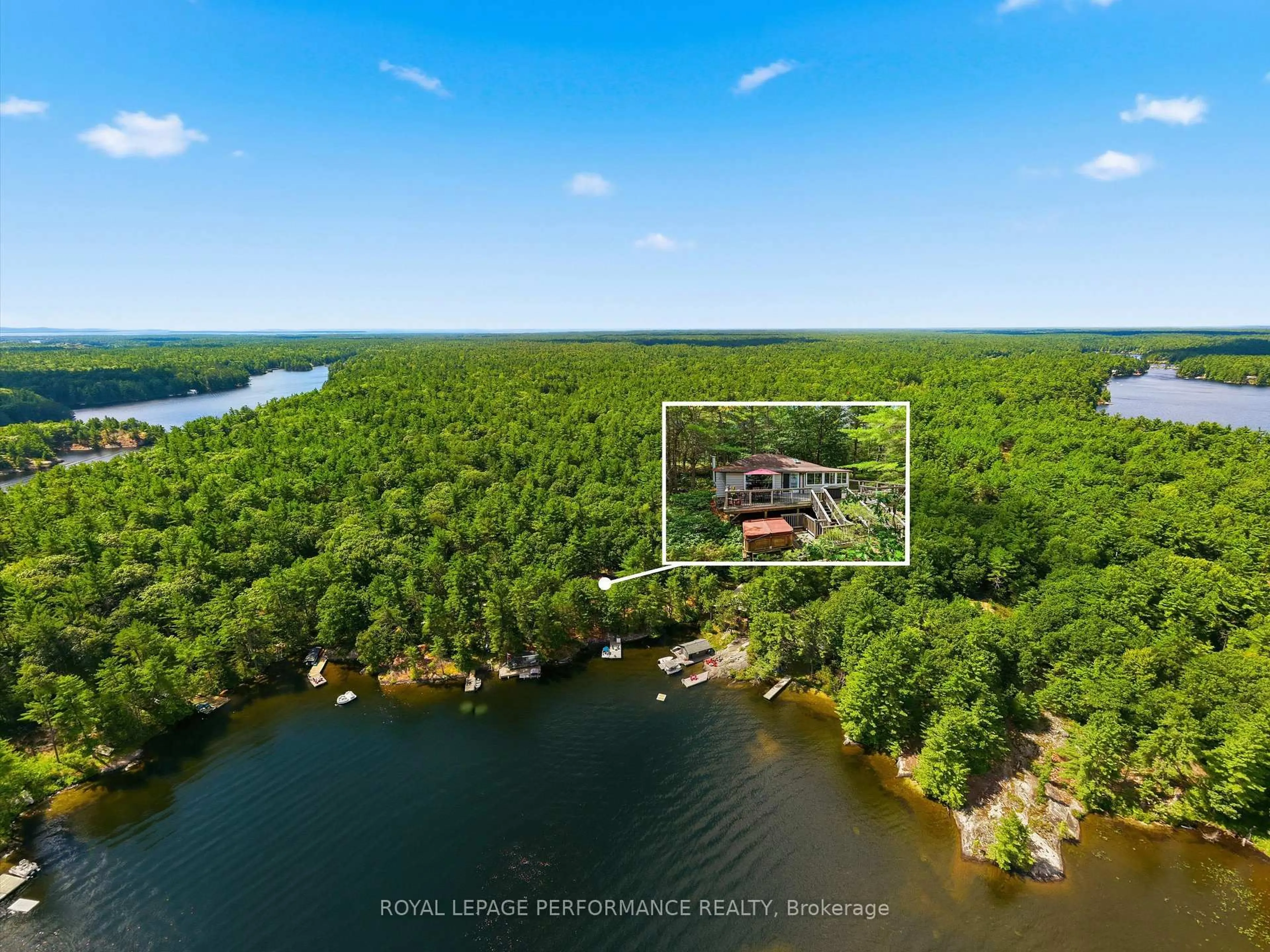 A pic from outside/outdoor area/front of a property/back of a property/a pic from drone, water/lake/river/ocean view for 9596 Go Home Lake Shore, Georgian Bay Ontario P0E 1E0