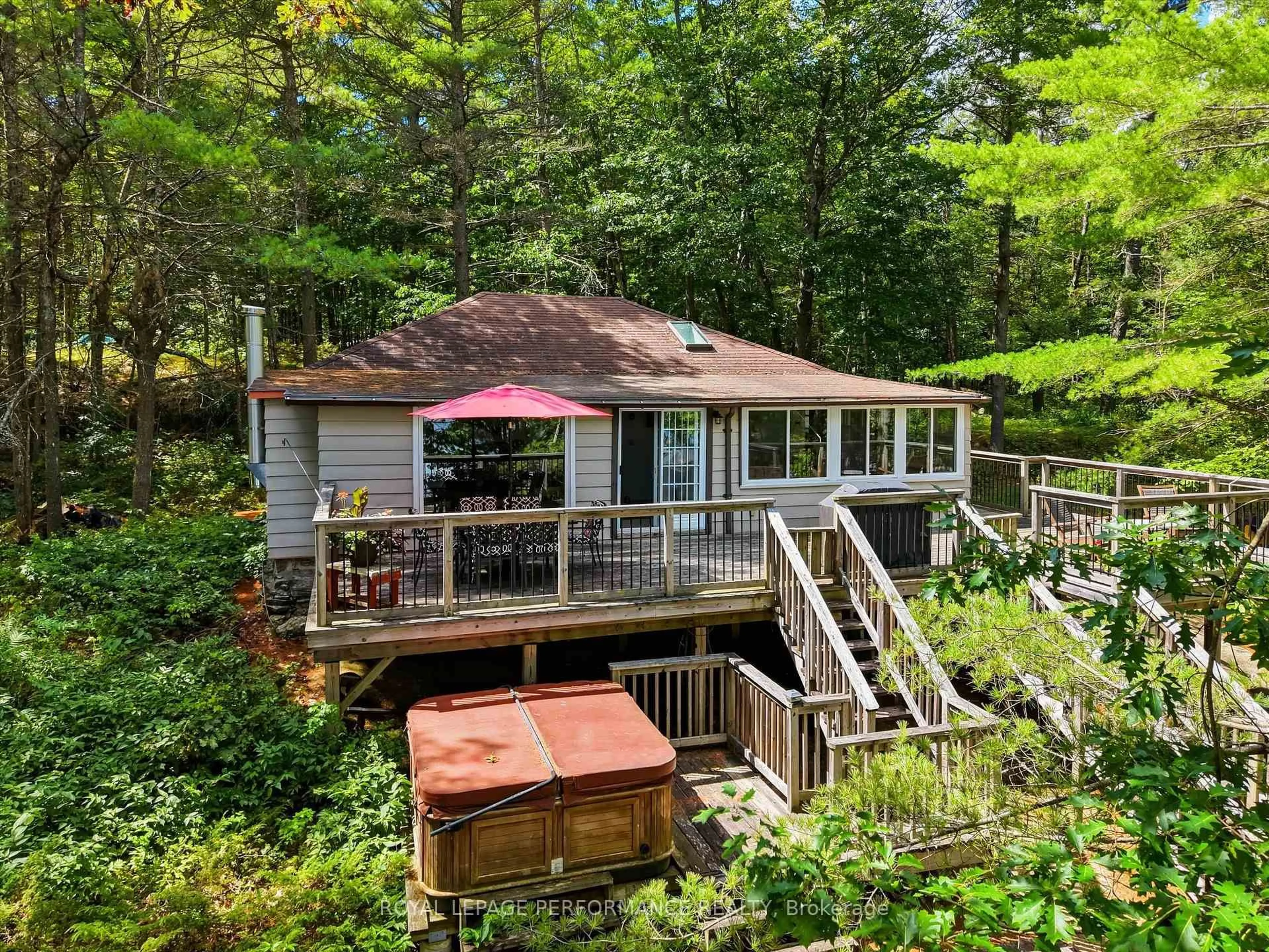 A pic from outside/outdoor area/front of a property/back of a property/a pic from drone, water/lake/river/ocean view for 9596 Go Home Lake Shore, Georgian Bay Ontario P0E 1E0