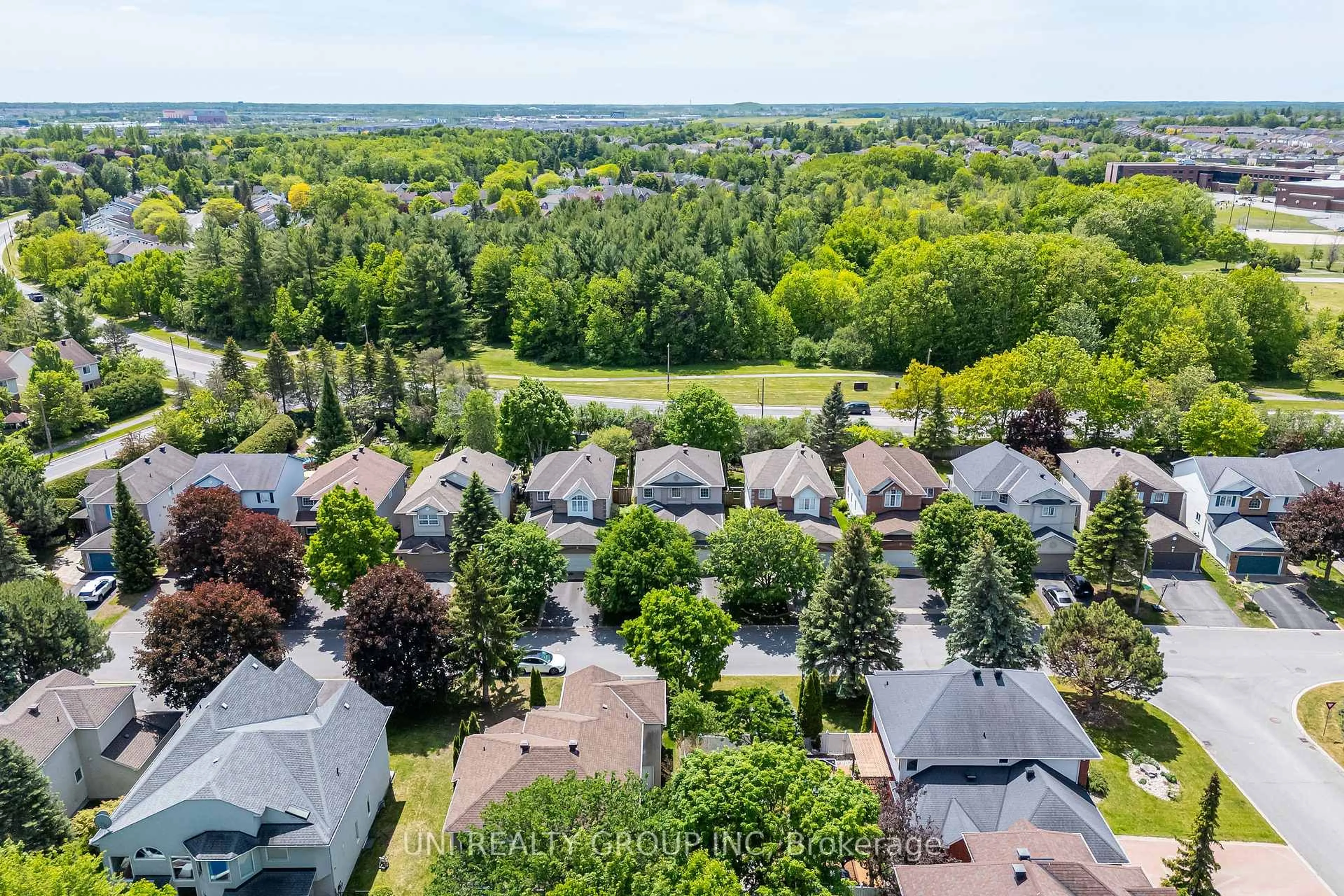 A pic from outside/outdoor area/front of a property/back of a property/a pic from drone, unknown for 11 LANGFORD Cres, Kanata Ontario K2K 2N4