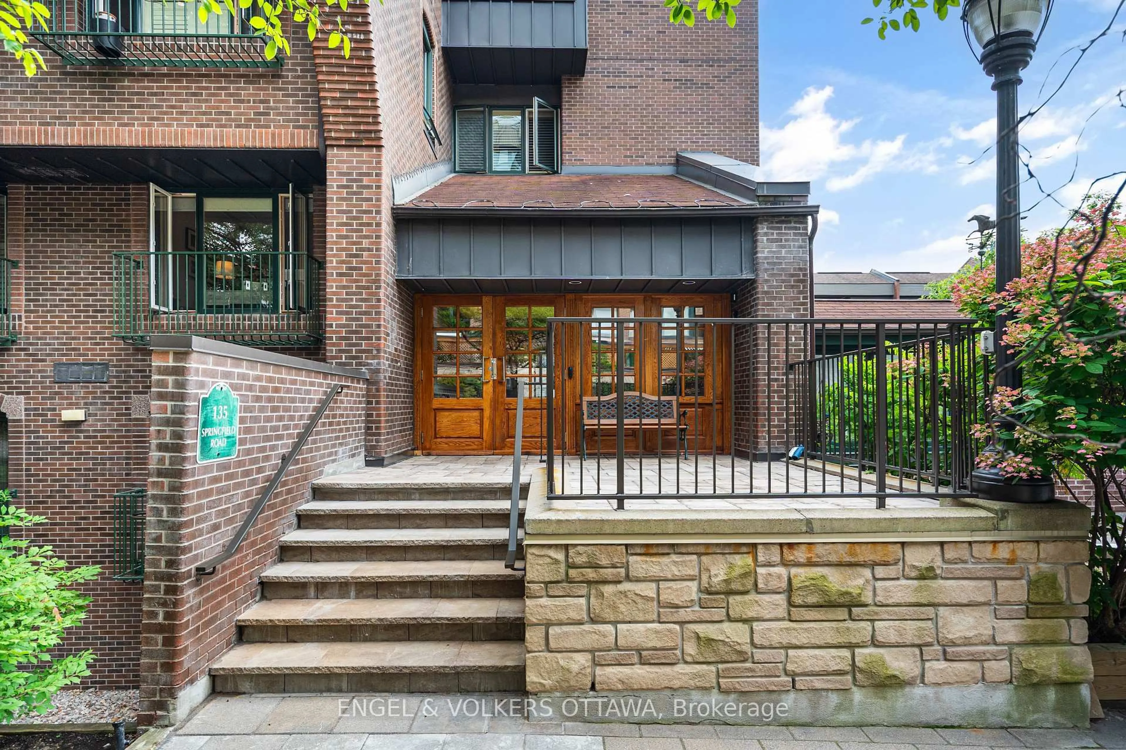 Home with brick exterior material, street for 135 Springfield Rd #5, Ottawa Ontario K1M 1C5
