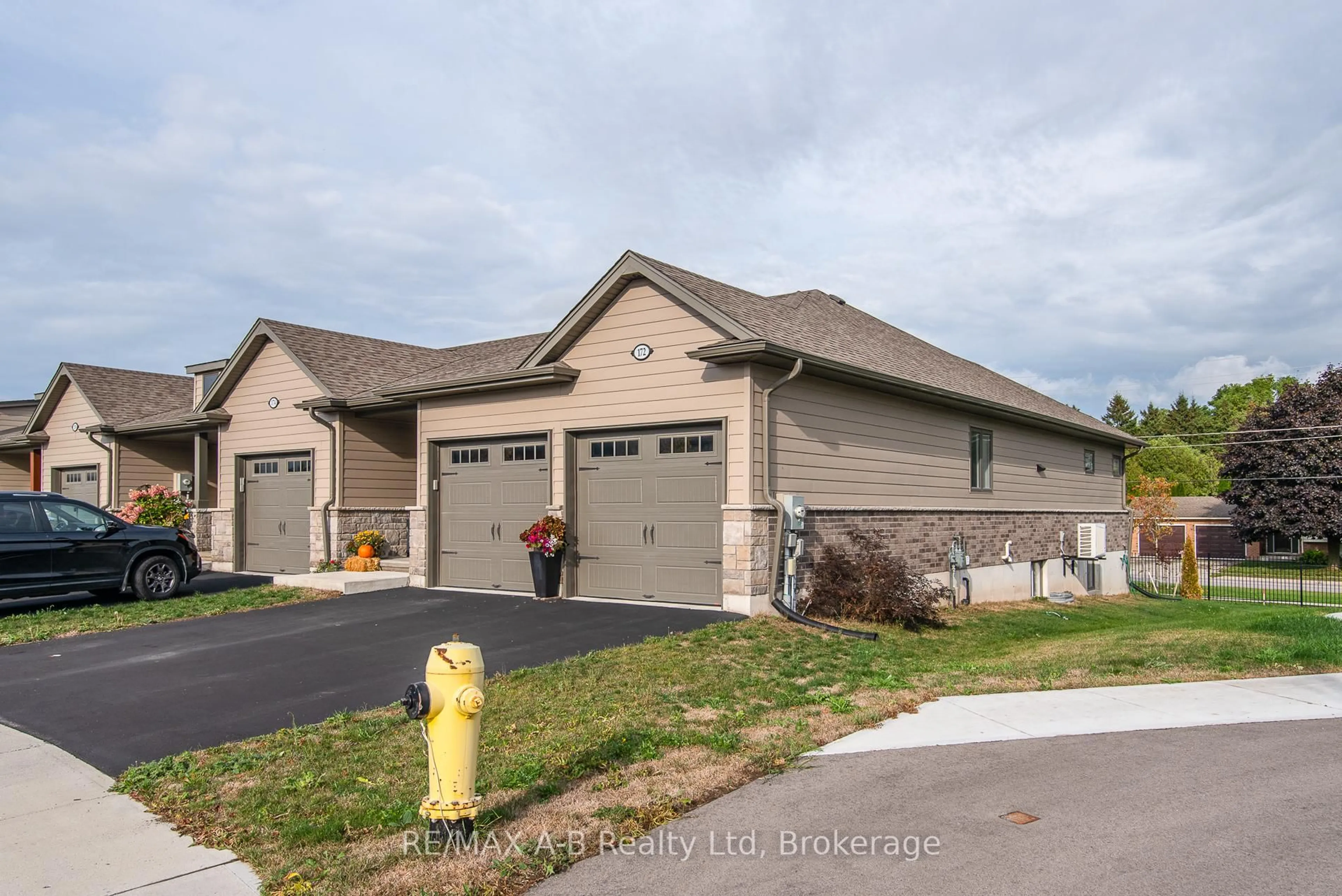 Home with brick exterior material, street for 172 Hooper St, St. Marys Ontario N4X 0C1