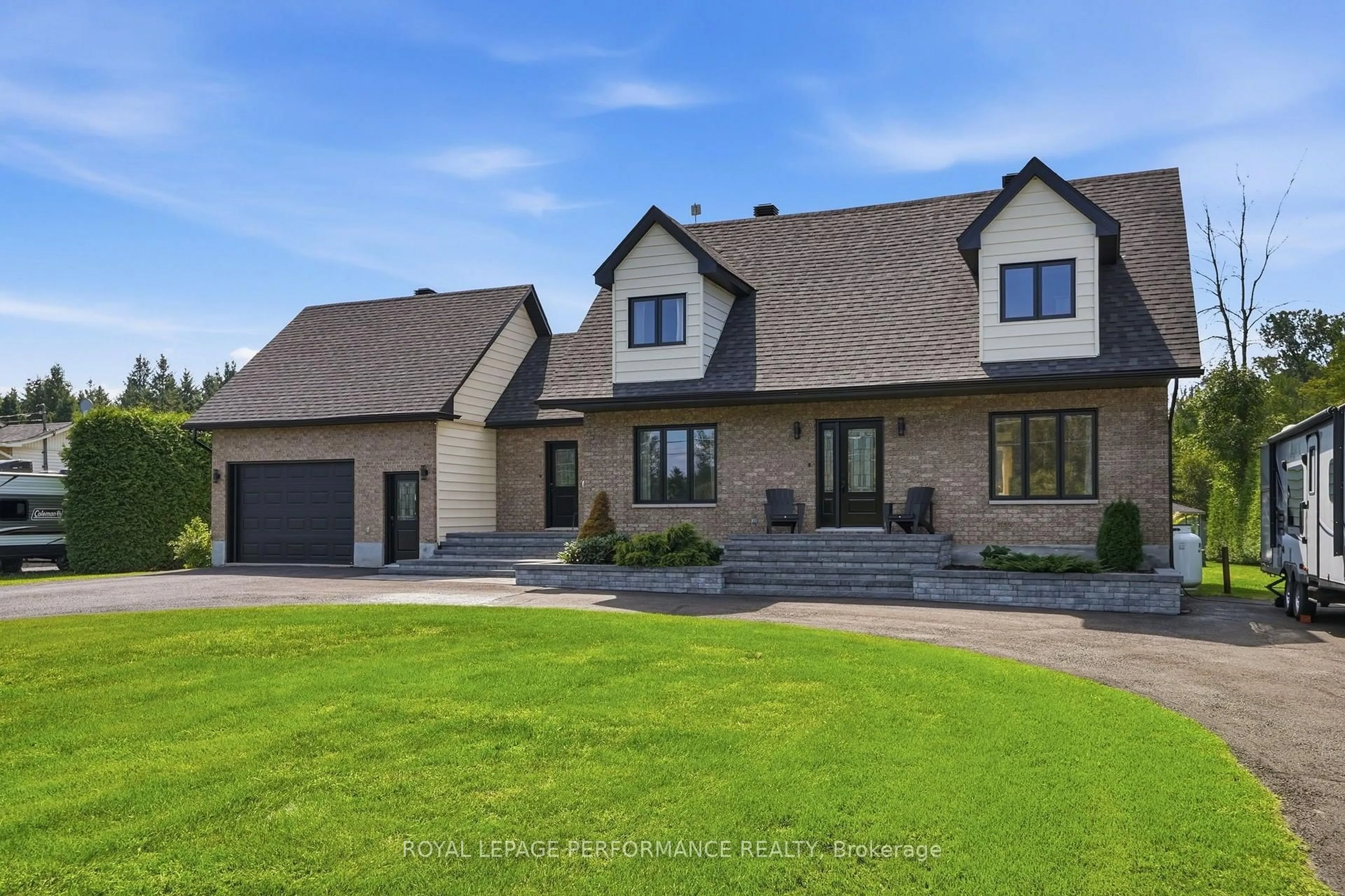 Home with brick exterior material, street for 3246 Pattee Rd, East Hawkesbury Ontario K6A 2R2