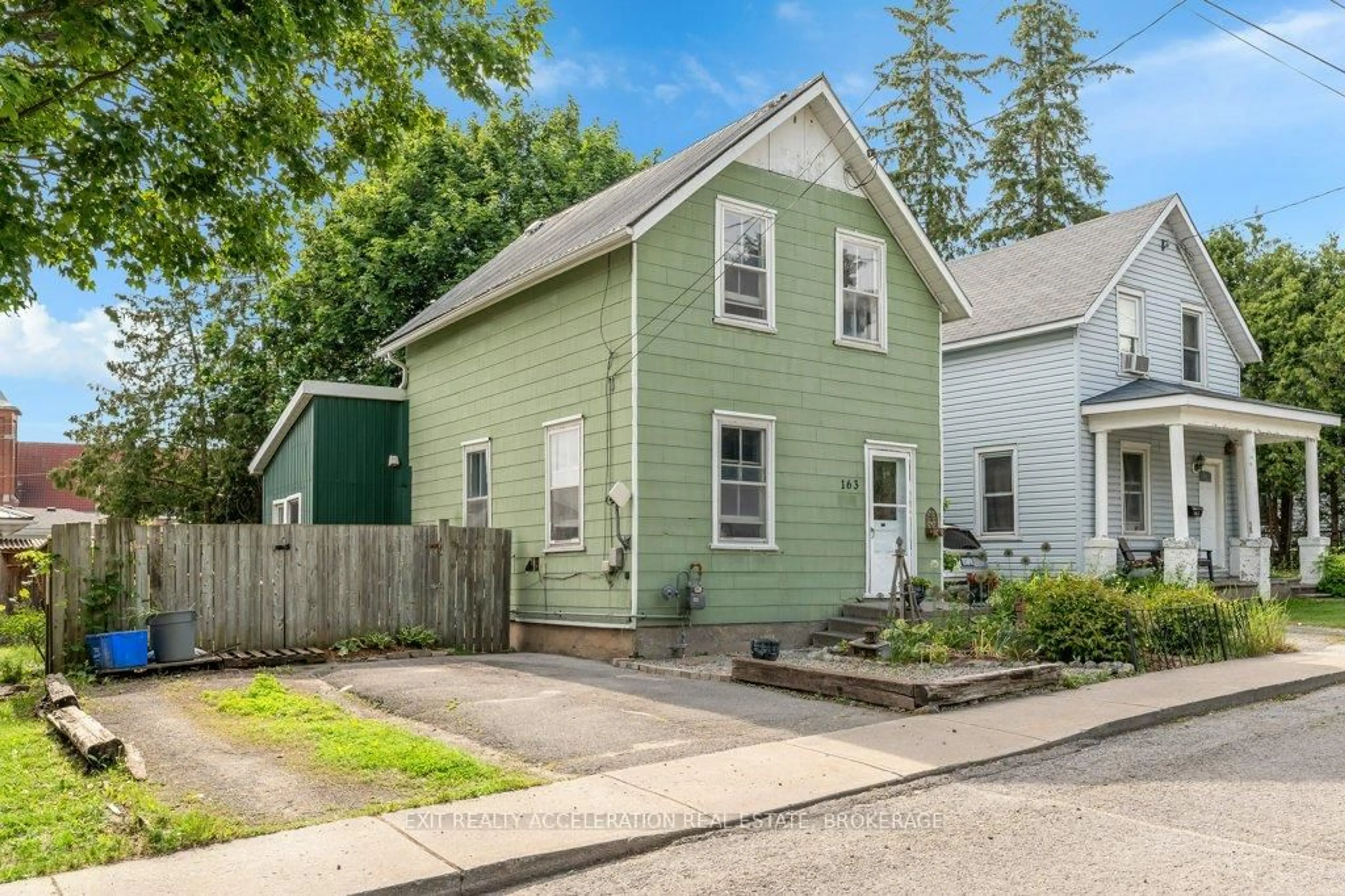 Home with vinyl exterior material, street for 163 Green St, Deseronto Ontario K0K 1X0