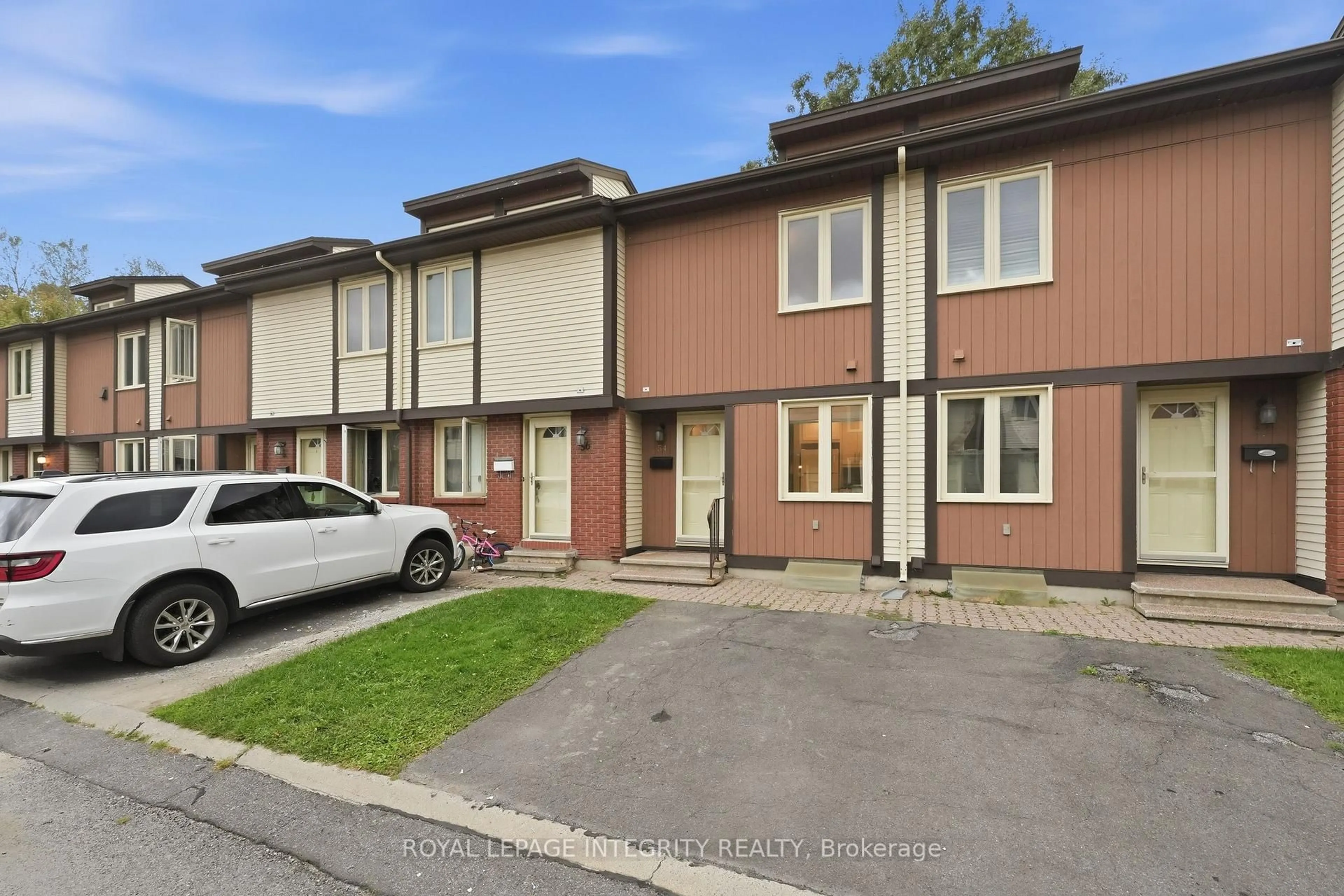 A pic from outside/outdoor area/front of a property/back of a property/a pic from drone, street for 811 Connaught Ave #54, Ottawa Ontario K2B 8K3