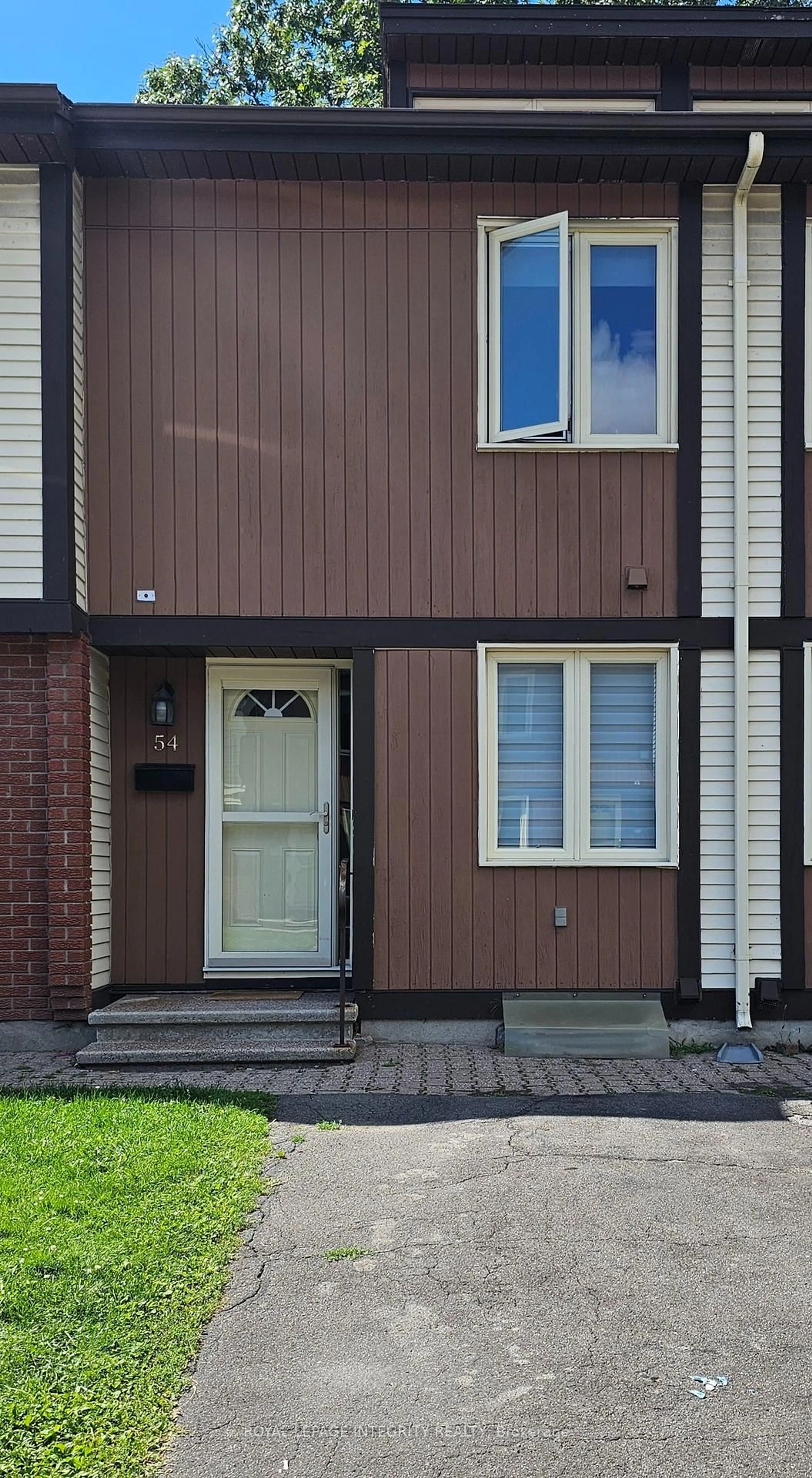 Home with vinyl exterior material, street for 811 Connaught Ave #54, Ottawa Ontario K2B 8K3
