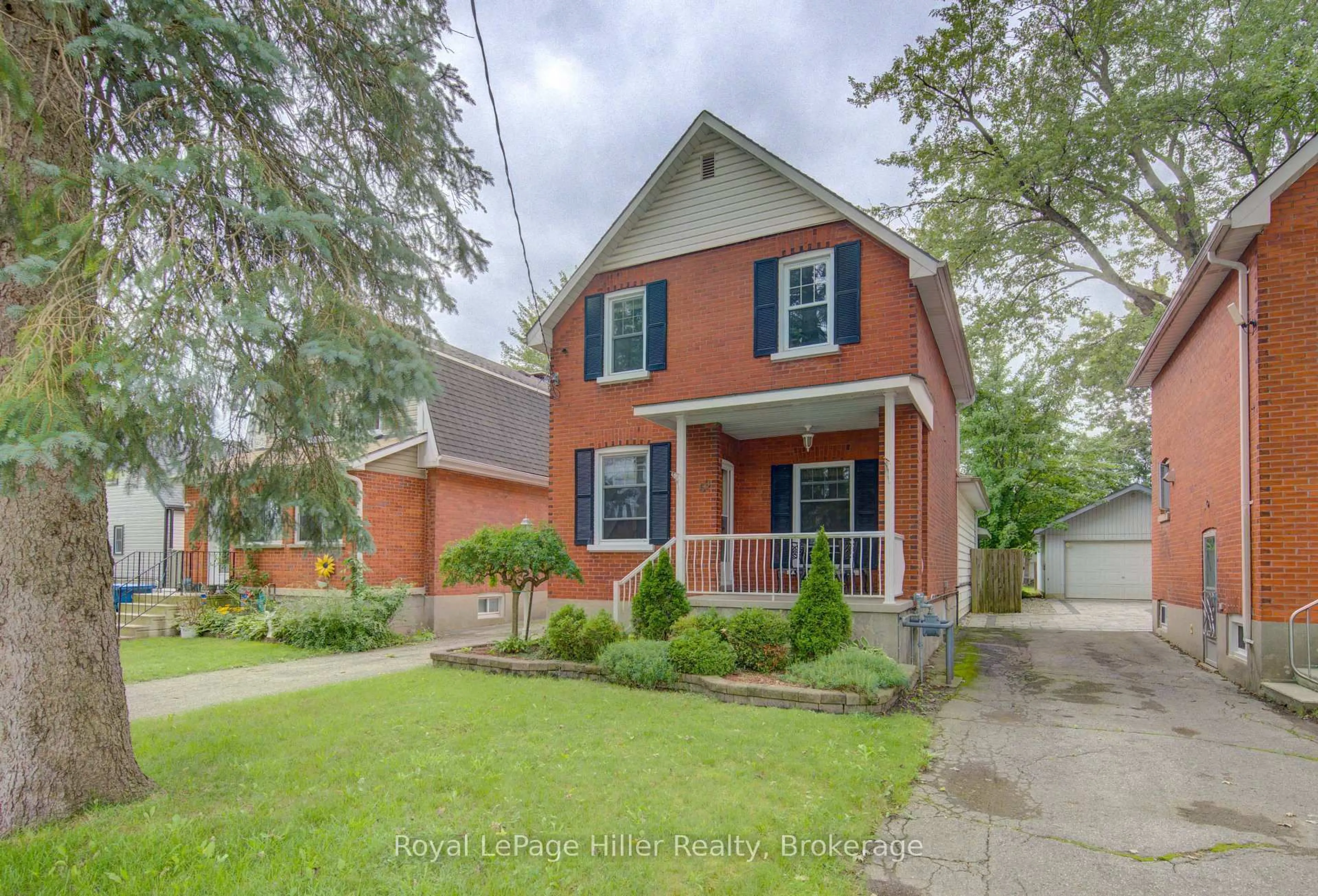 Home with brick exterior material, street for 69 Cherry St, Stratford Ontario N5A 2E9