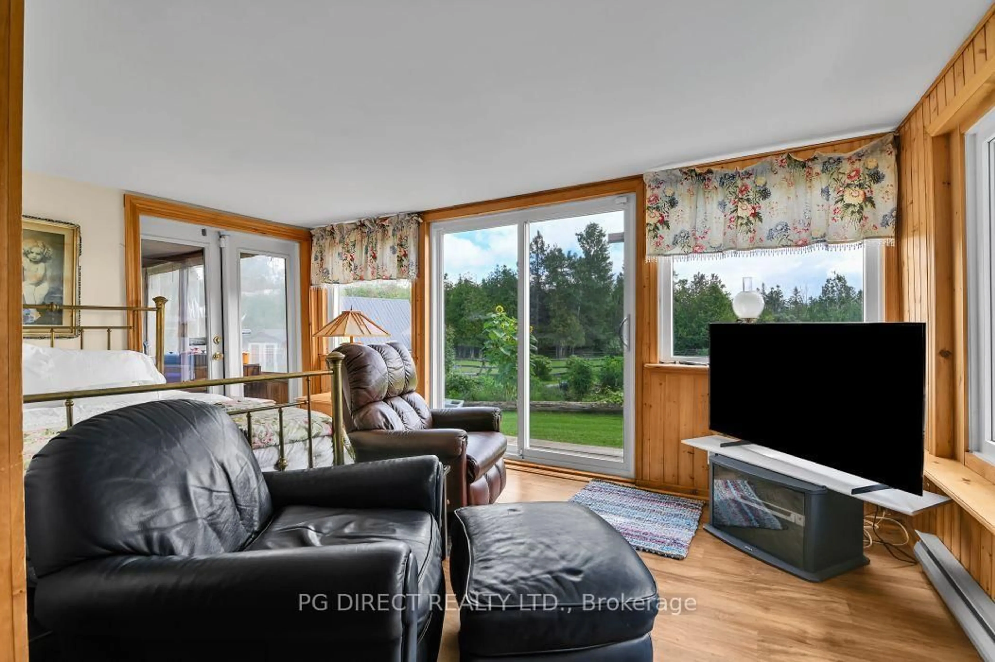 Living room with furniture, wood/laminate floor for 1563 9th Line, Beckwith Ontario K1C 3P2