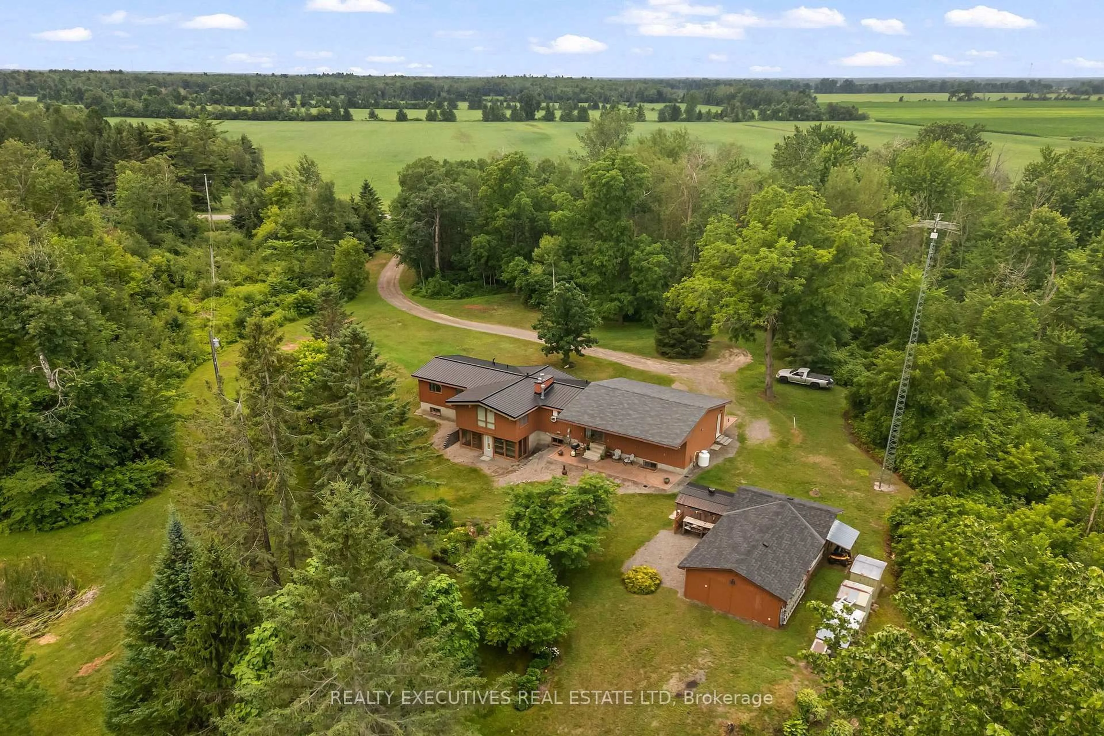A pic from outside/outdoor area/front of a property/back of a property/a pic from drone, forest/trees view for 785 Boundary Rd, North Dundas Ontario K0E 1S0