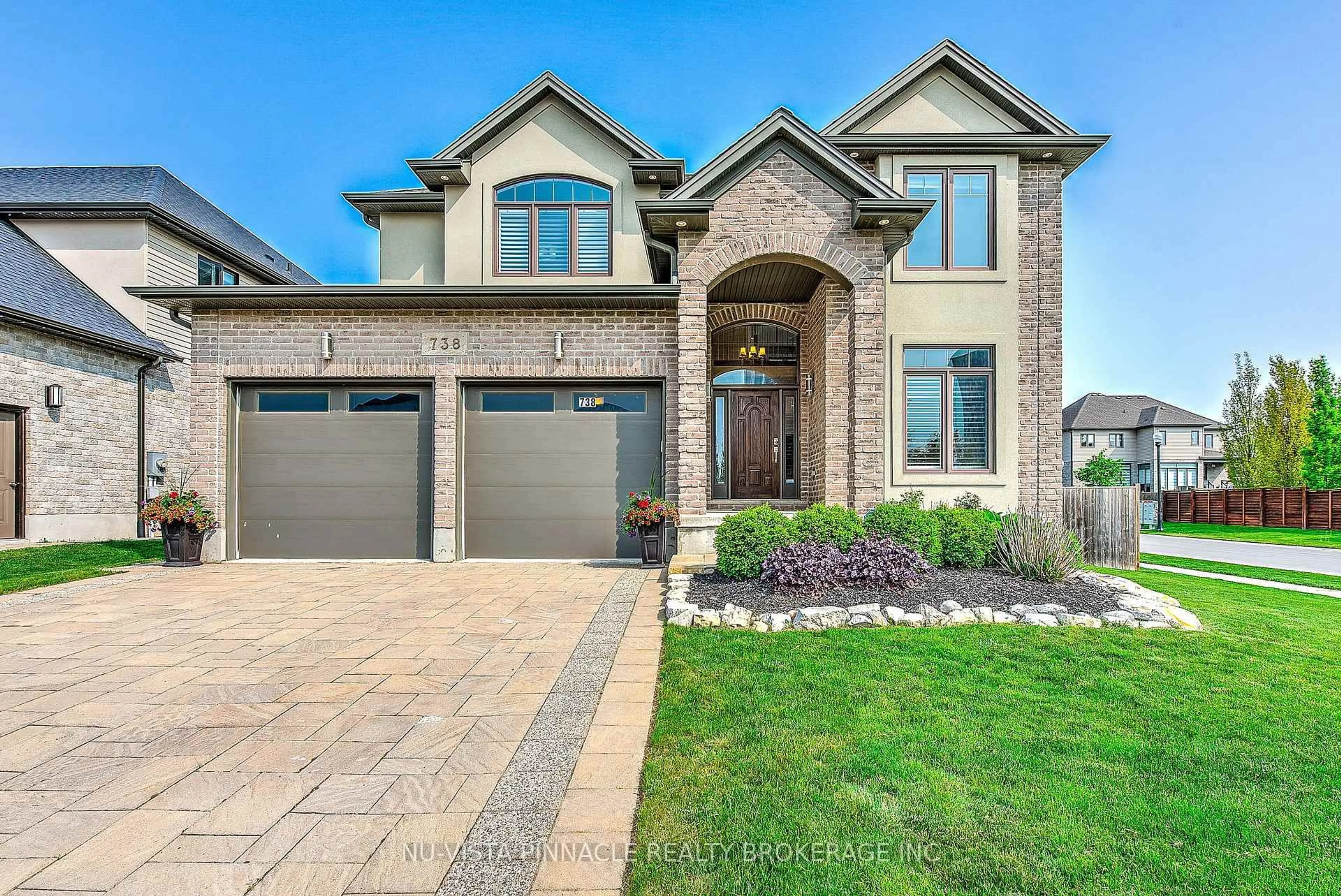 Home with brick exterior material, street for 738 Hickoryridge Common, London North Ontario N6G 0M9