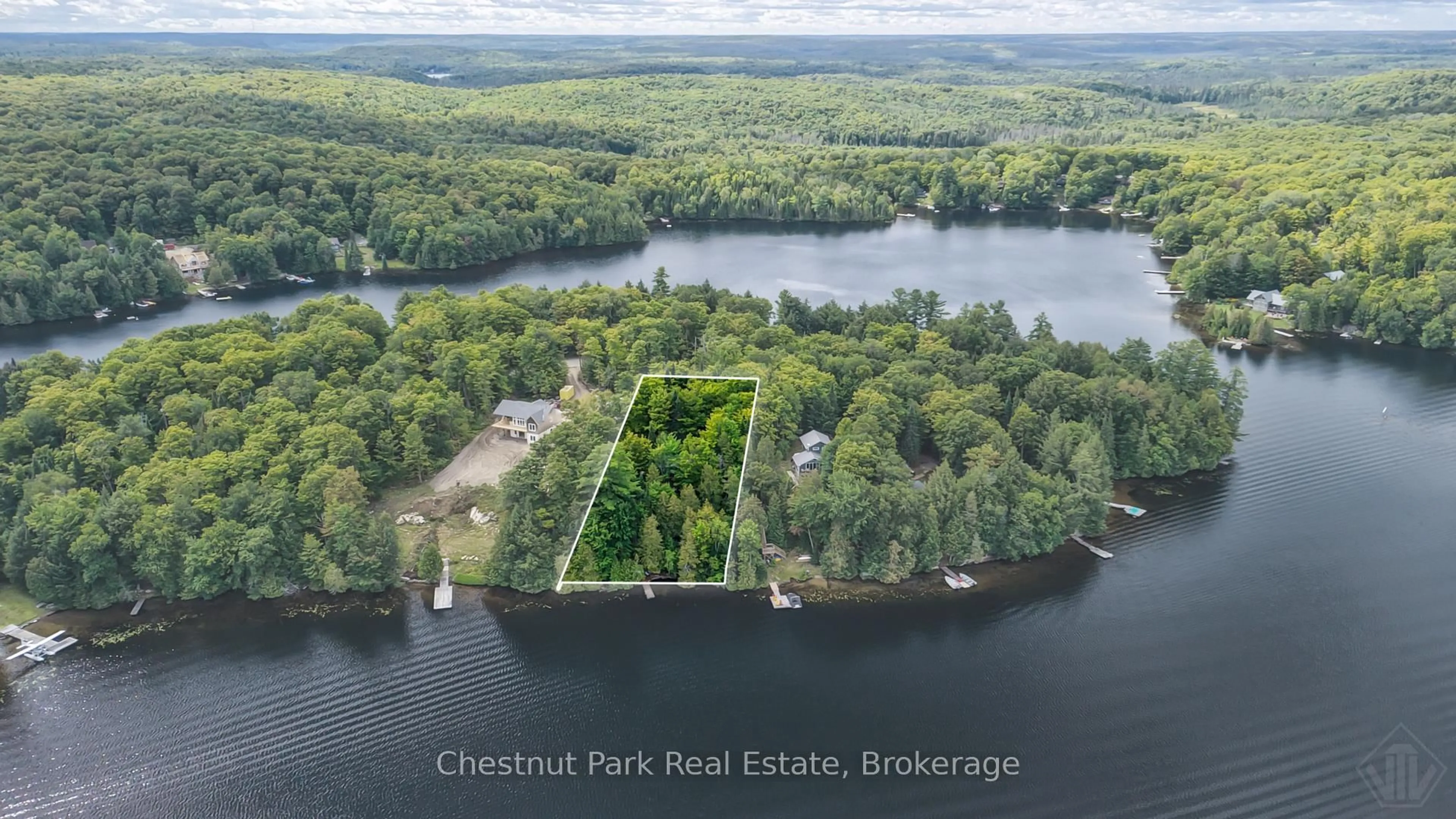 A pic from outside/outdoor area/front of a property/back of a property/a pic from drone, water/lake/river/ocean view for 1470 Bay Lake Rd, Perry Ontario P0A 1J0