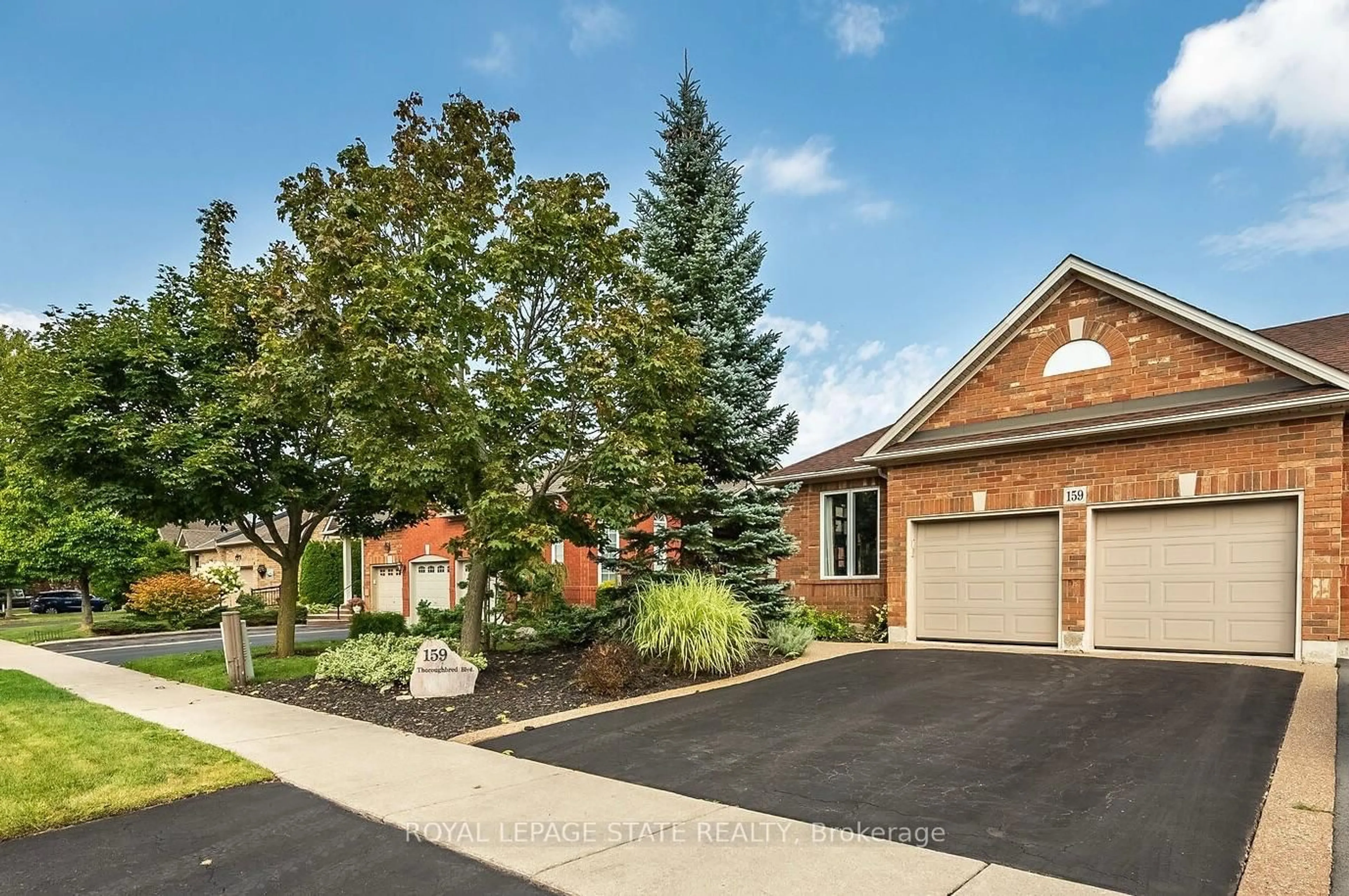 Home with brick exterior material, street for 159 Thoroughbred Blvd, Hamilton Ontario L9K 1N2