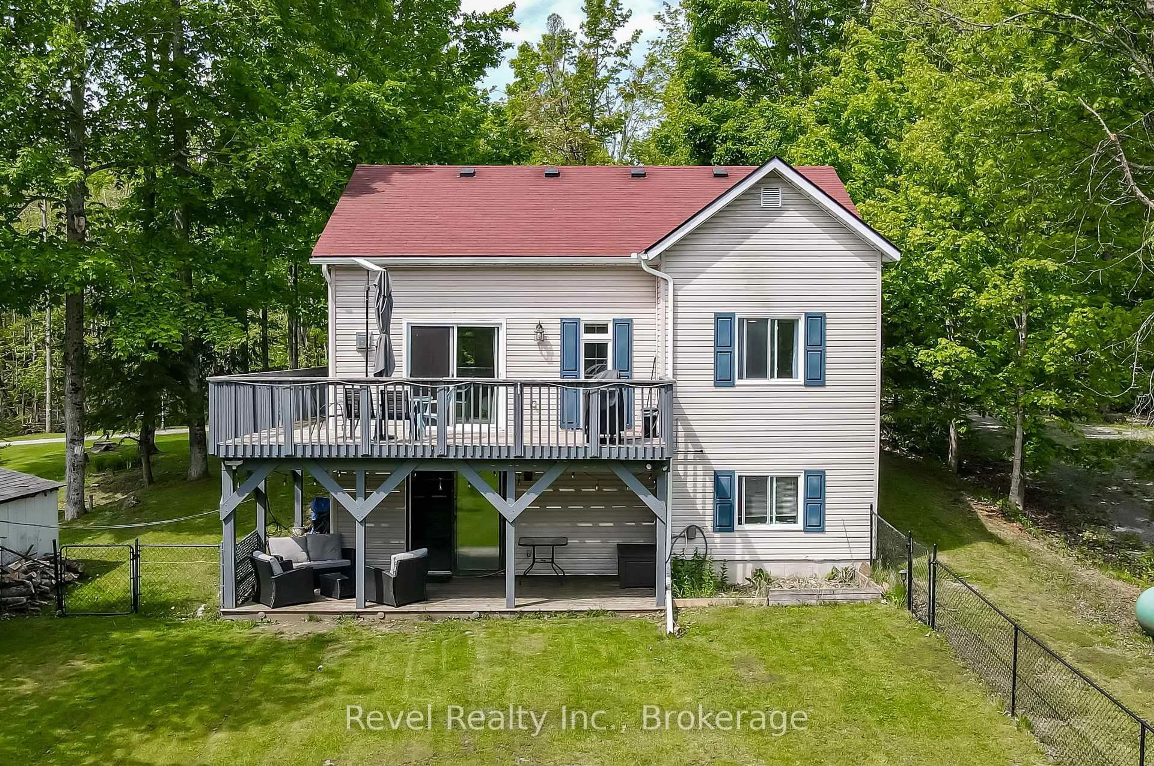 A pic from outside/outdoor area/front of a property/back of a property/a pic from drone, water/lake/river/ocean view for 15 Fire Route 92, Trent Lakes Ontario K0M 1A0