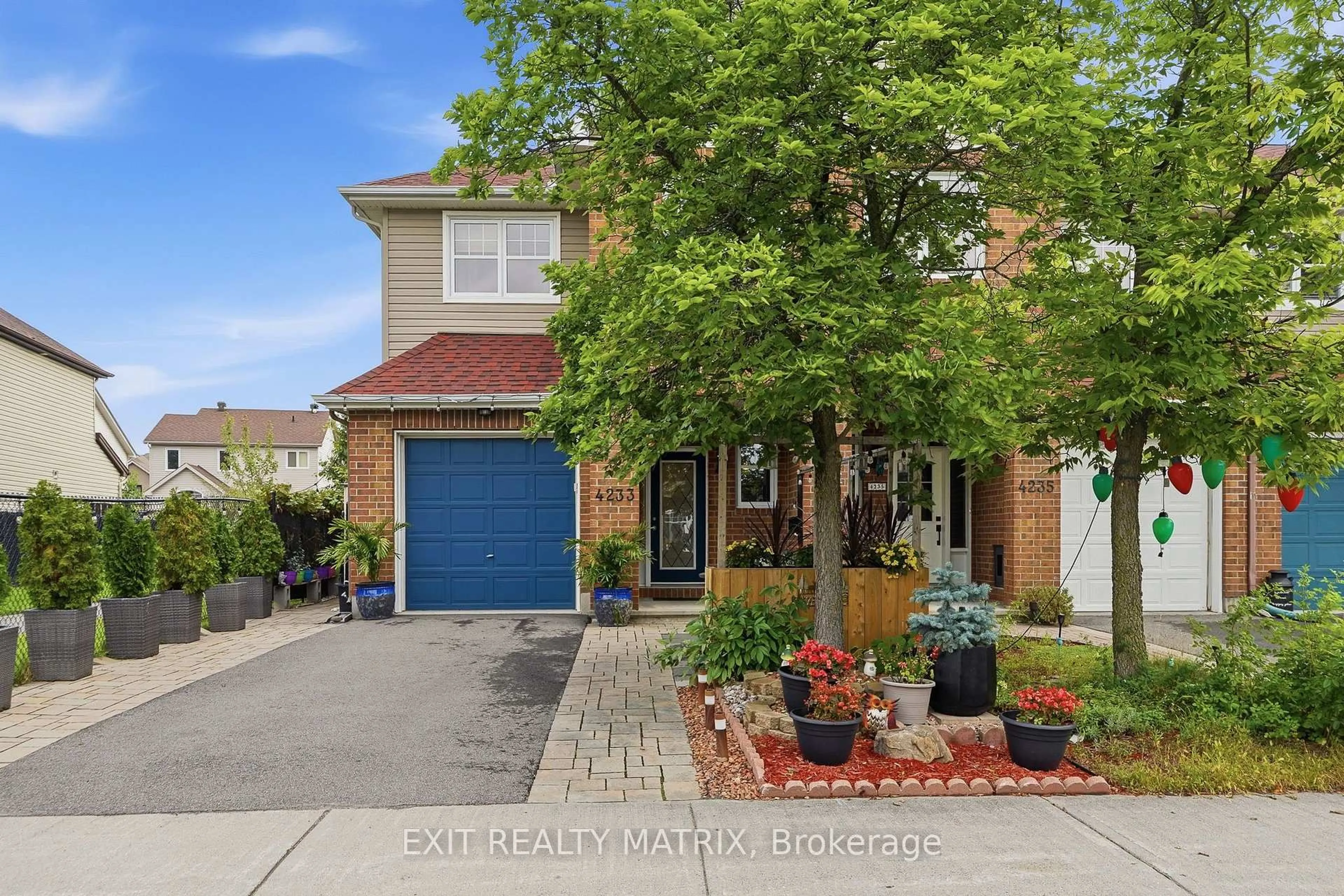 Home with brick exterior material, street for 4233 Kelly Farm Dr, Ottawa Ontario K1T 0A5