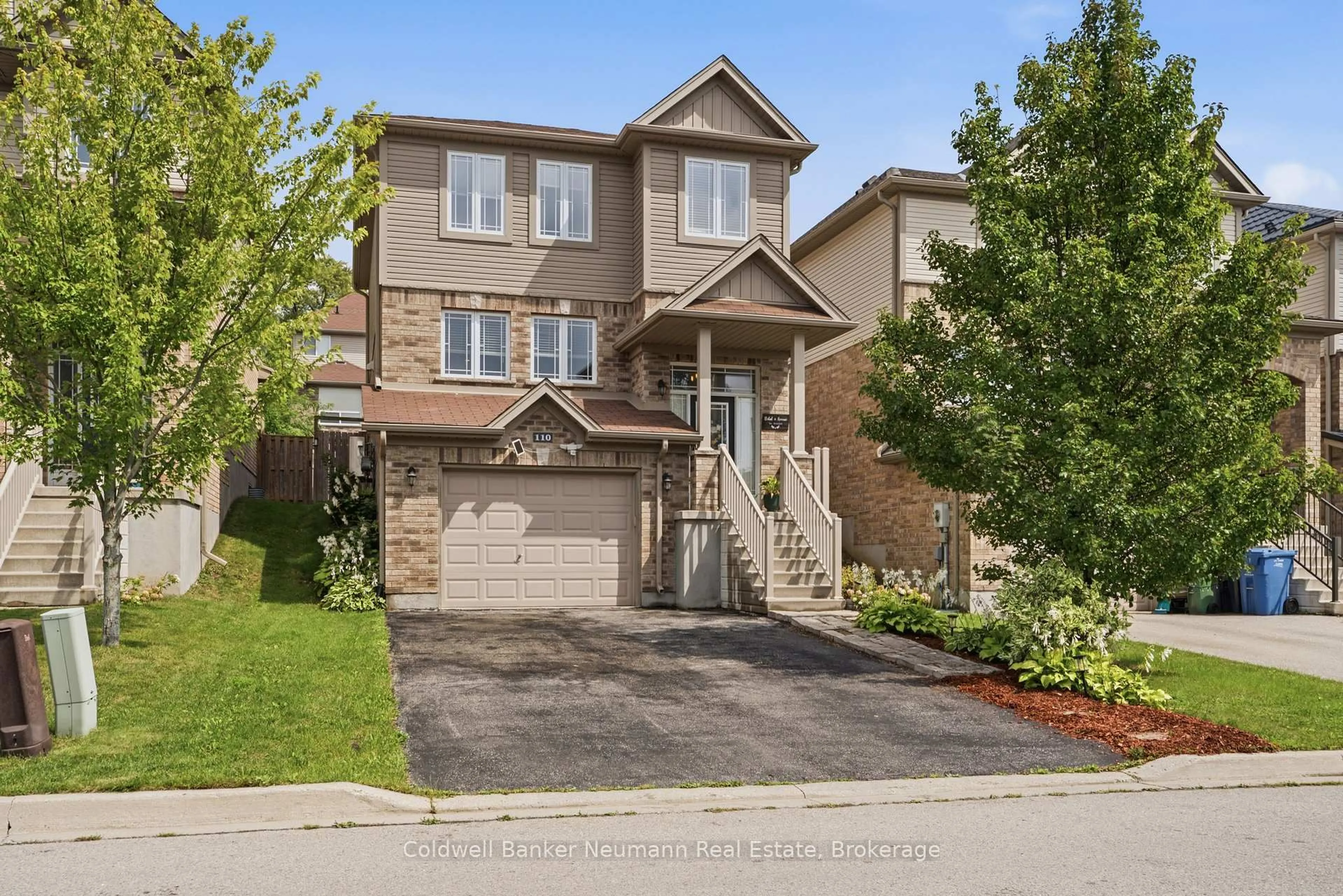 Home with brick exterior material, street for 110 Oakes Cres, Guelph Ontario N1E 0J5
