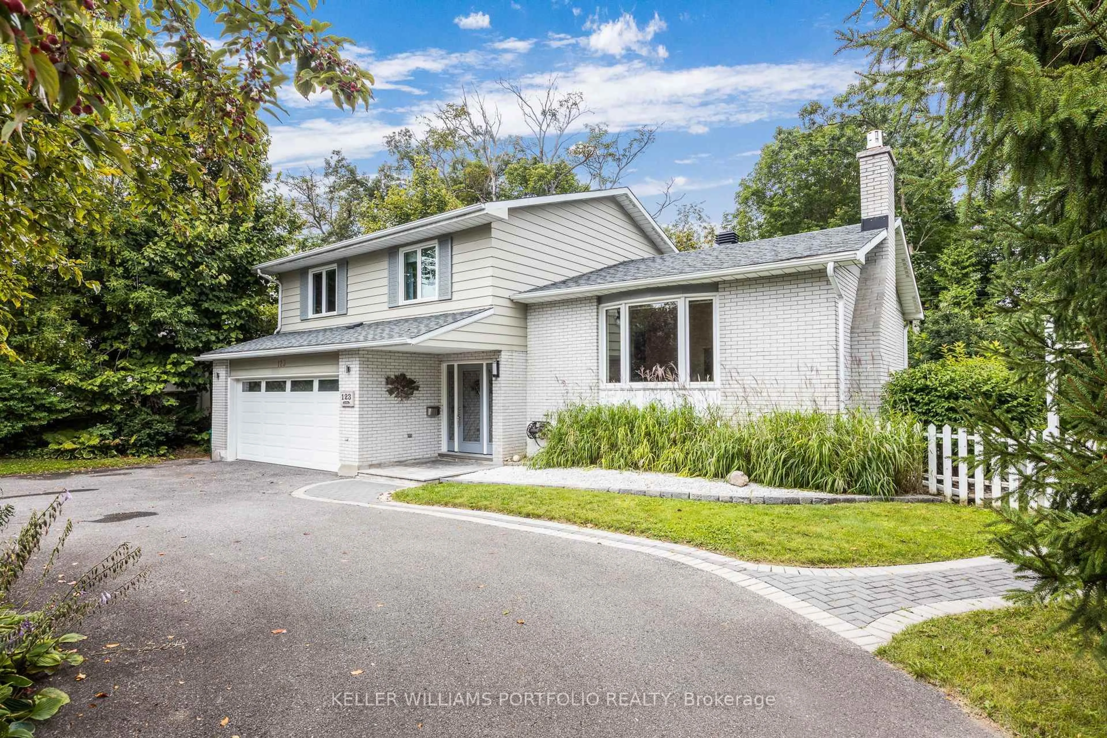 Home with vinyl exterior material, street for 123 Dorothea Dr, Ottawa Ontario K1V 7C6