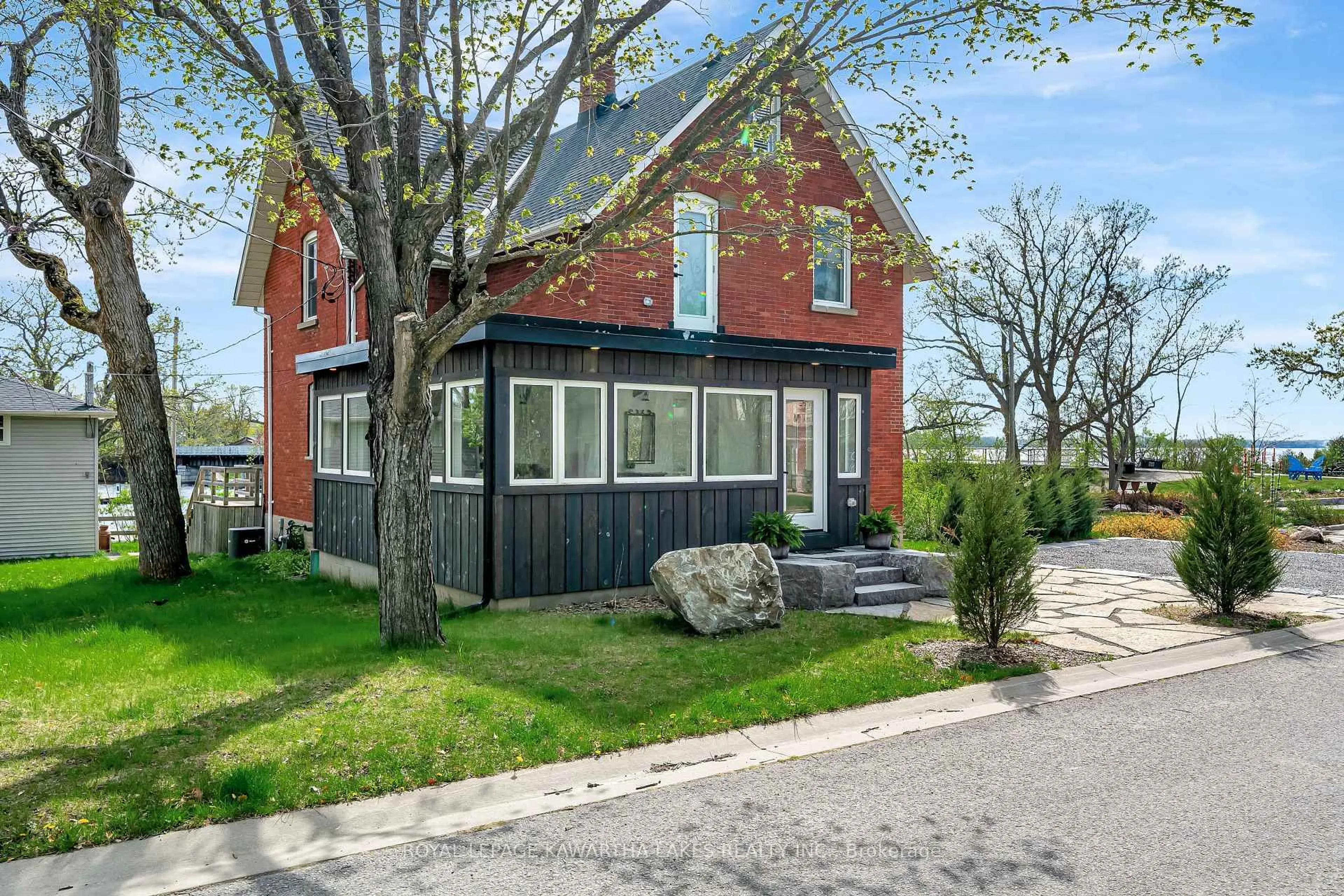Home with brick exterior material, street for 45 OAK St, Kawartha Lakes Ontario K0M 1N0