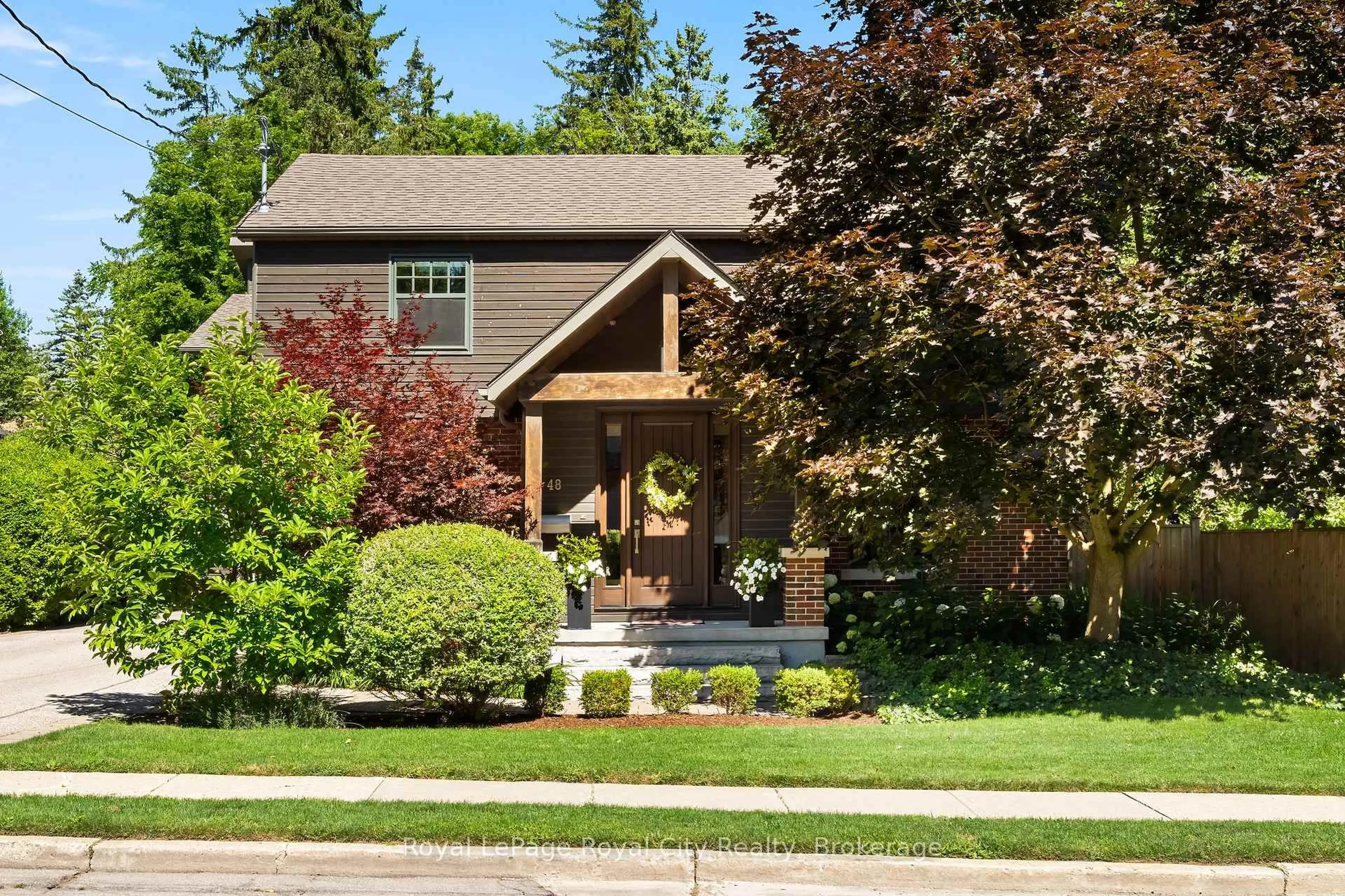 Home with brick exterior material, street for 48 Campion Ave, Guelph Ontario N1H 5L6