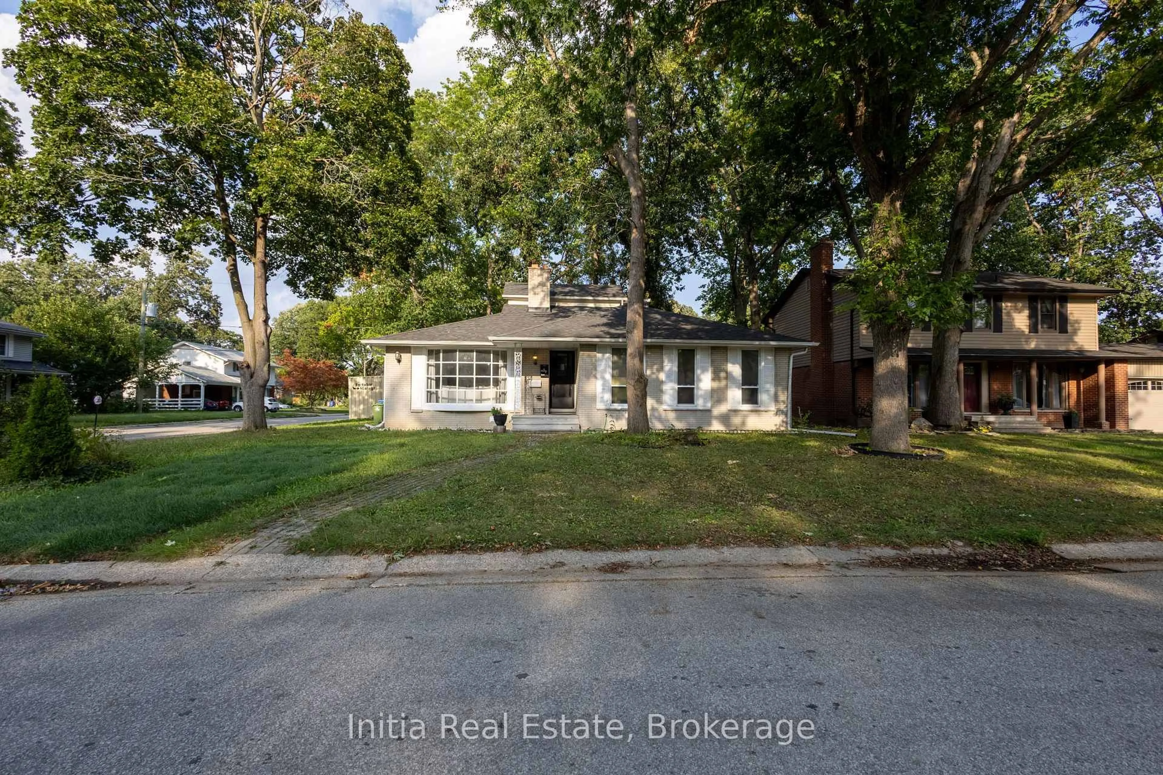 Home with brick exterior material, street for 3400 St Patrick's Dr, Windsor Ontario N9E 3H4