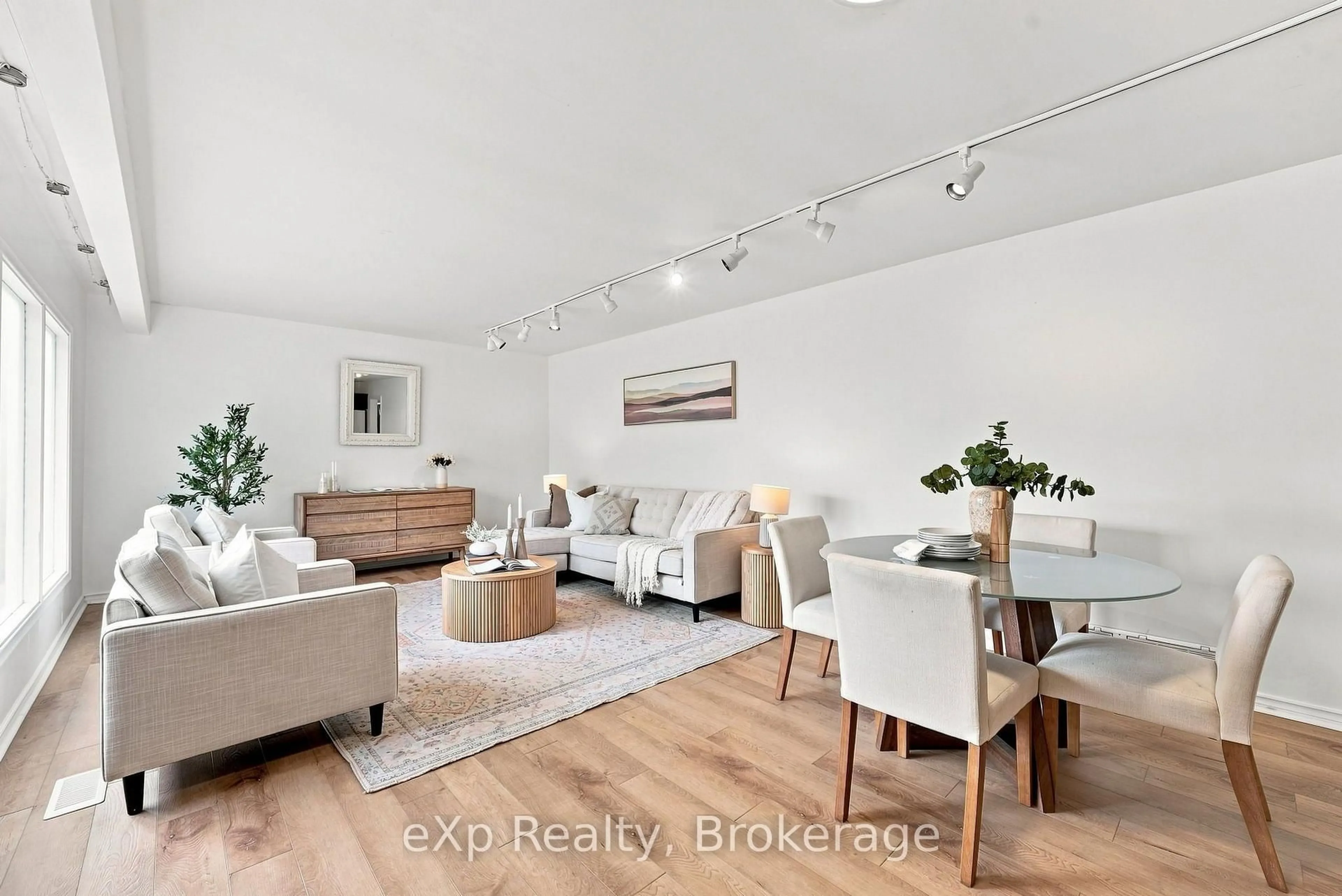 Living room with furniture, wood/laminate floor for 16 Robertson St, Cramahe Ontario K0K 1S0
