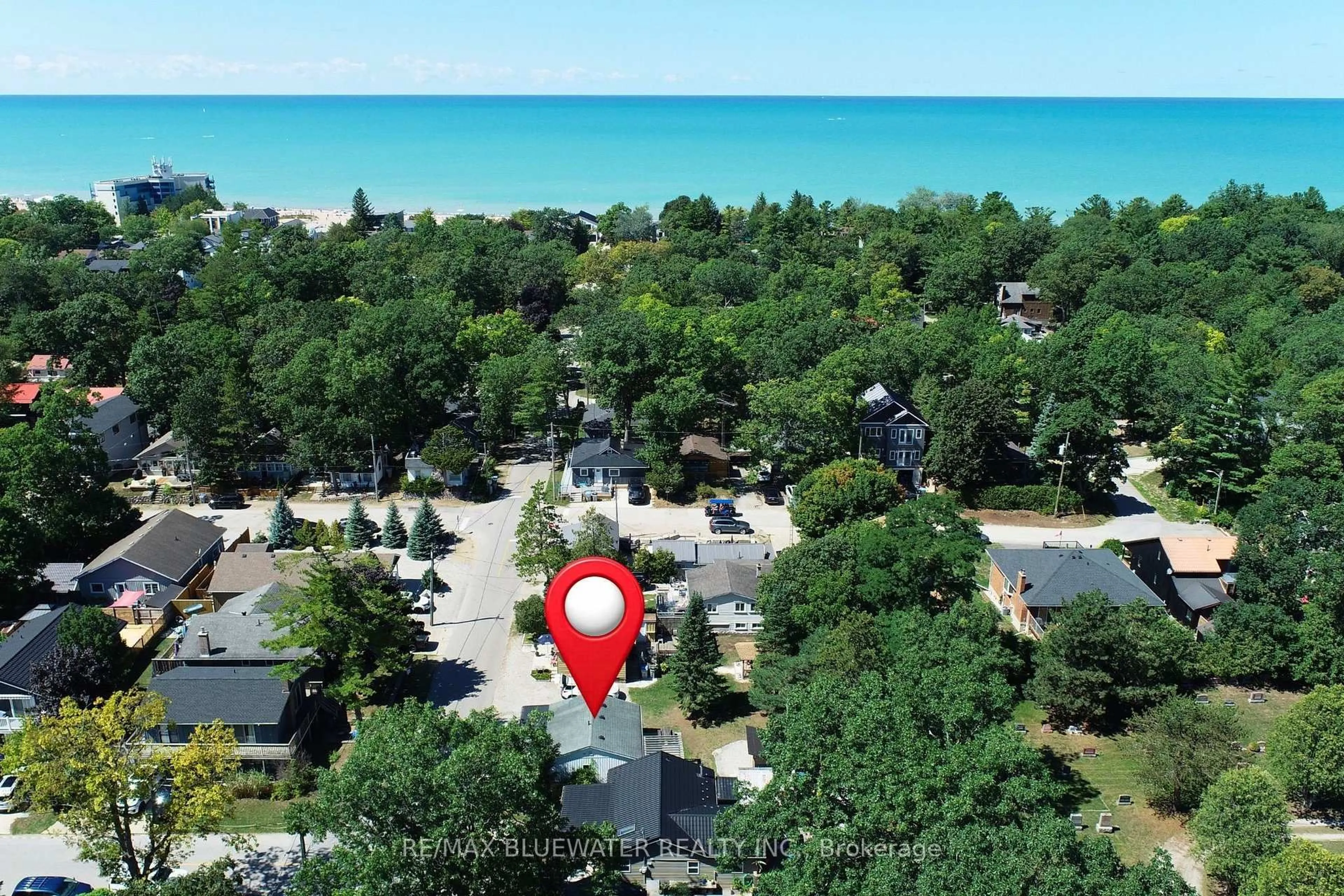A pic from outside/outdoor area/front of a property/back of a property/a pic from drone, water/lake/river/ocean view for 27 Oak St, Lambton Shores Ontario N0M 1T0