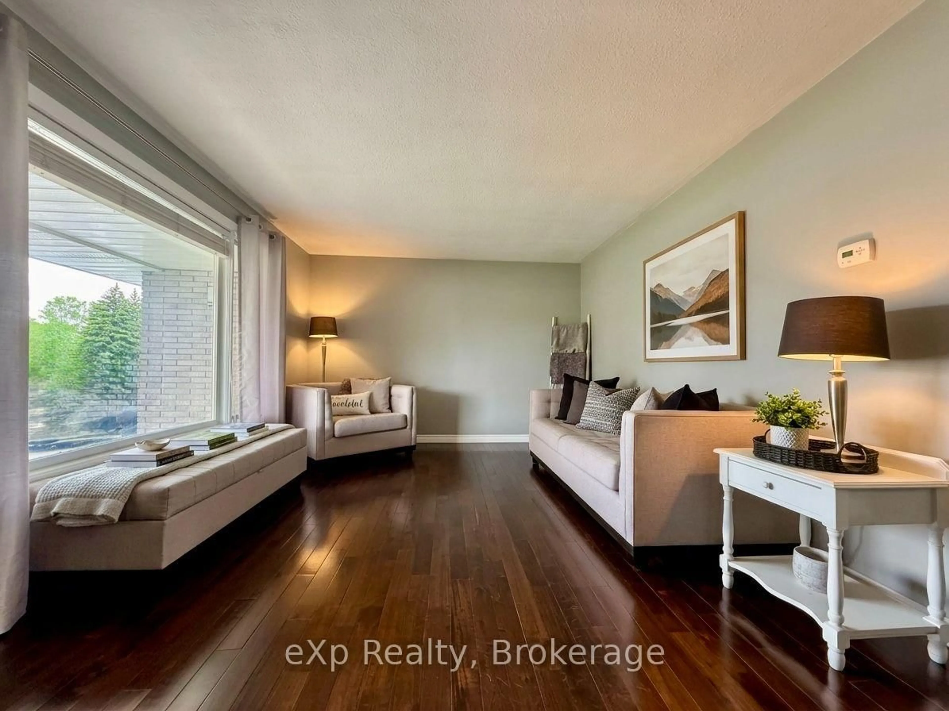 Living room with furniture, wood/laminate floor for 209 15th Ave, Hanover Ontario N4N 3E1