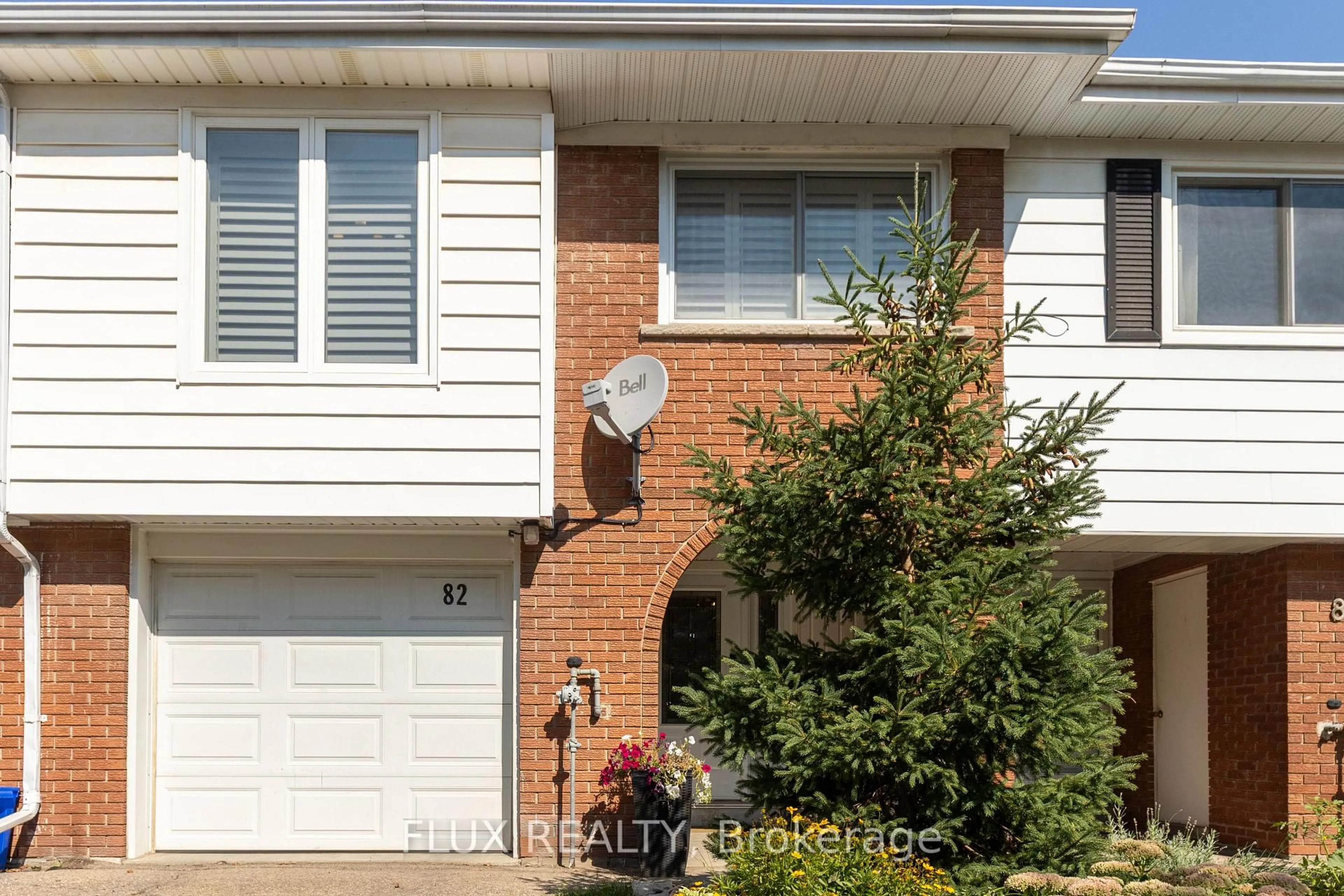 Home with brick exterior material, street for 82 Overlea Dr, Kitchener Ontario N2M 1T1
