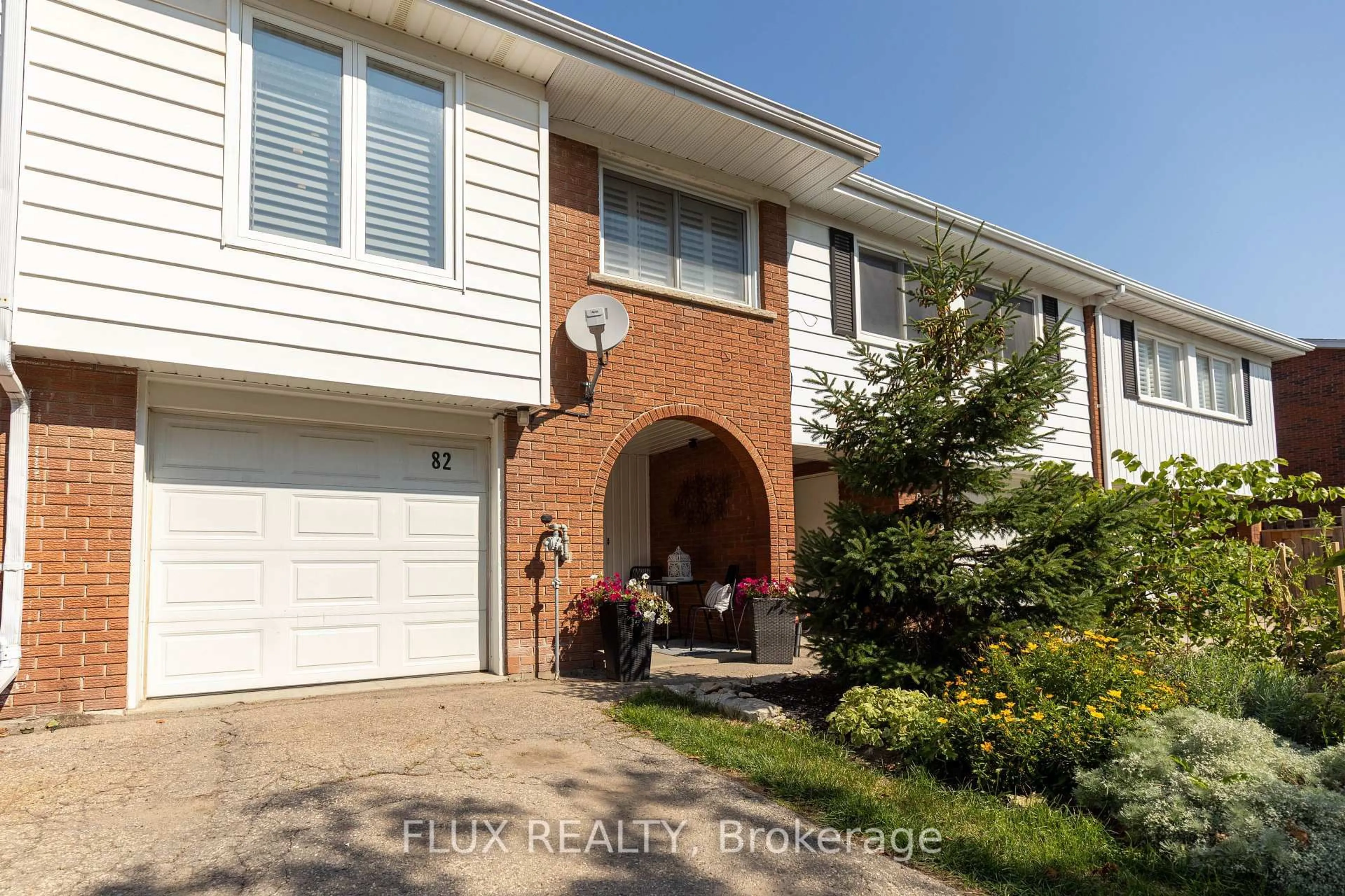 Home with brick exterior material, street for 82 Overlea Dr, Kitchener Ontario N2M 1T1